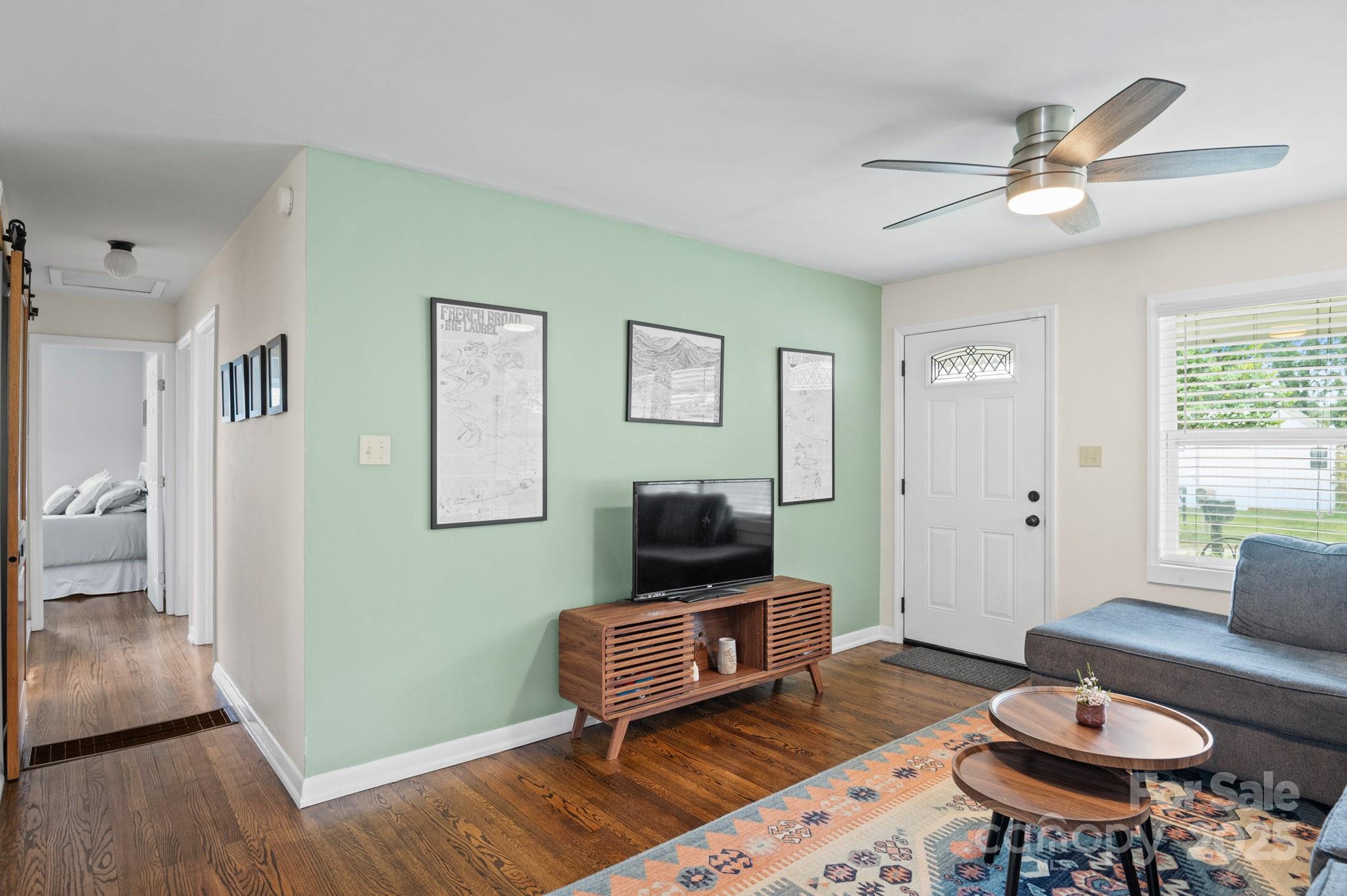 970 West Chapel Road Asheville, NC 28803 - Photo 7 of 19 a living room with furniture and a wooden floor