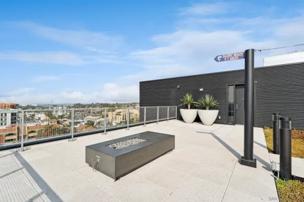 a view of a terrace with furniture