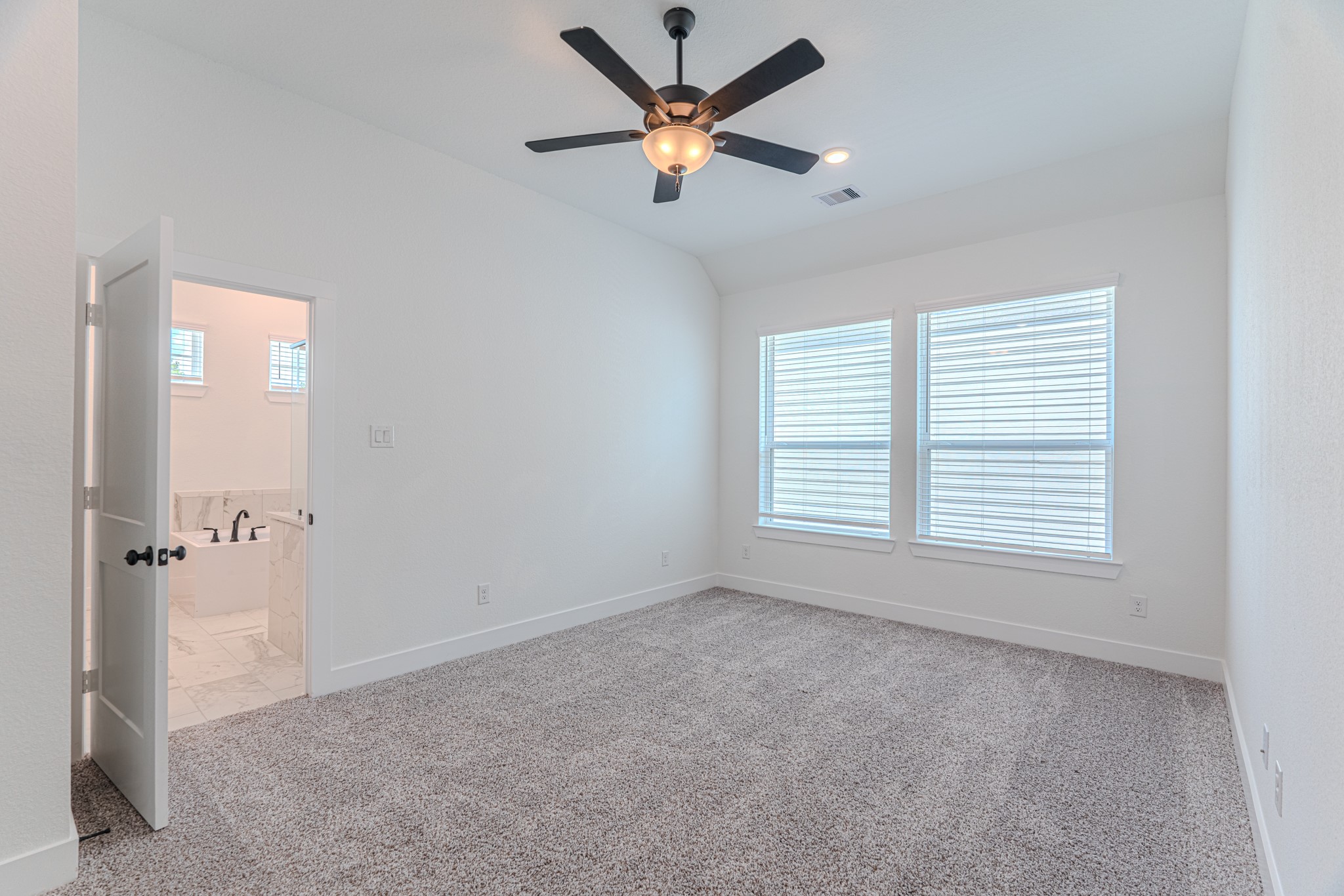 152 Red Cascade Trail Willis, TX 77318 - Photo 30 of 39 a view of an empty room with a window