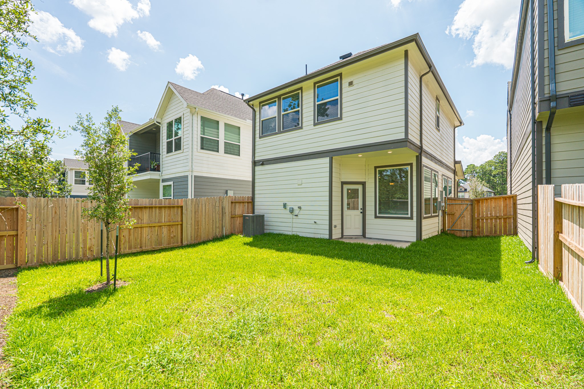 152 Red Cascade Trail Willis, TX 77318 - Photo 37 of 39 a view of a house with backyard