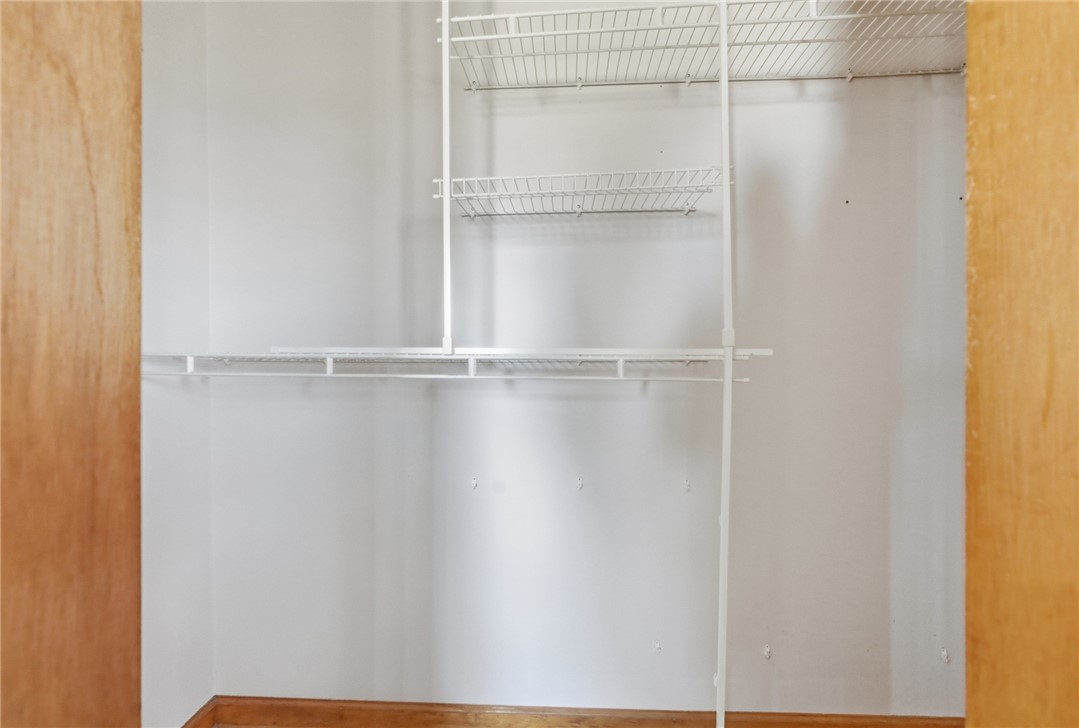 6718 Old Columbus Road South Vienna, OH 45369 - Photo 20 of 33 This spacious walk-in closet offers ample storage with versatile shelving.