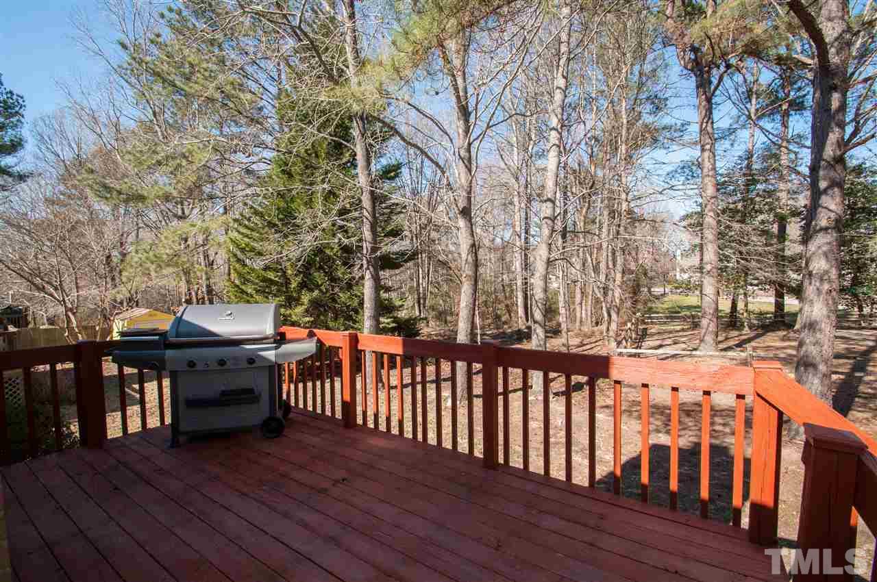 3517 Iron Sight Court Raleigh, NC 27616 - Photo 15 of 22 a view of a balcony with wooden floor and outdoor seating