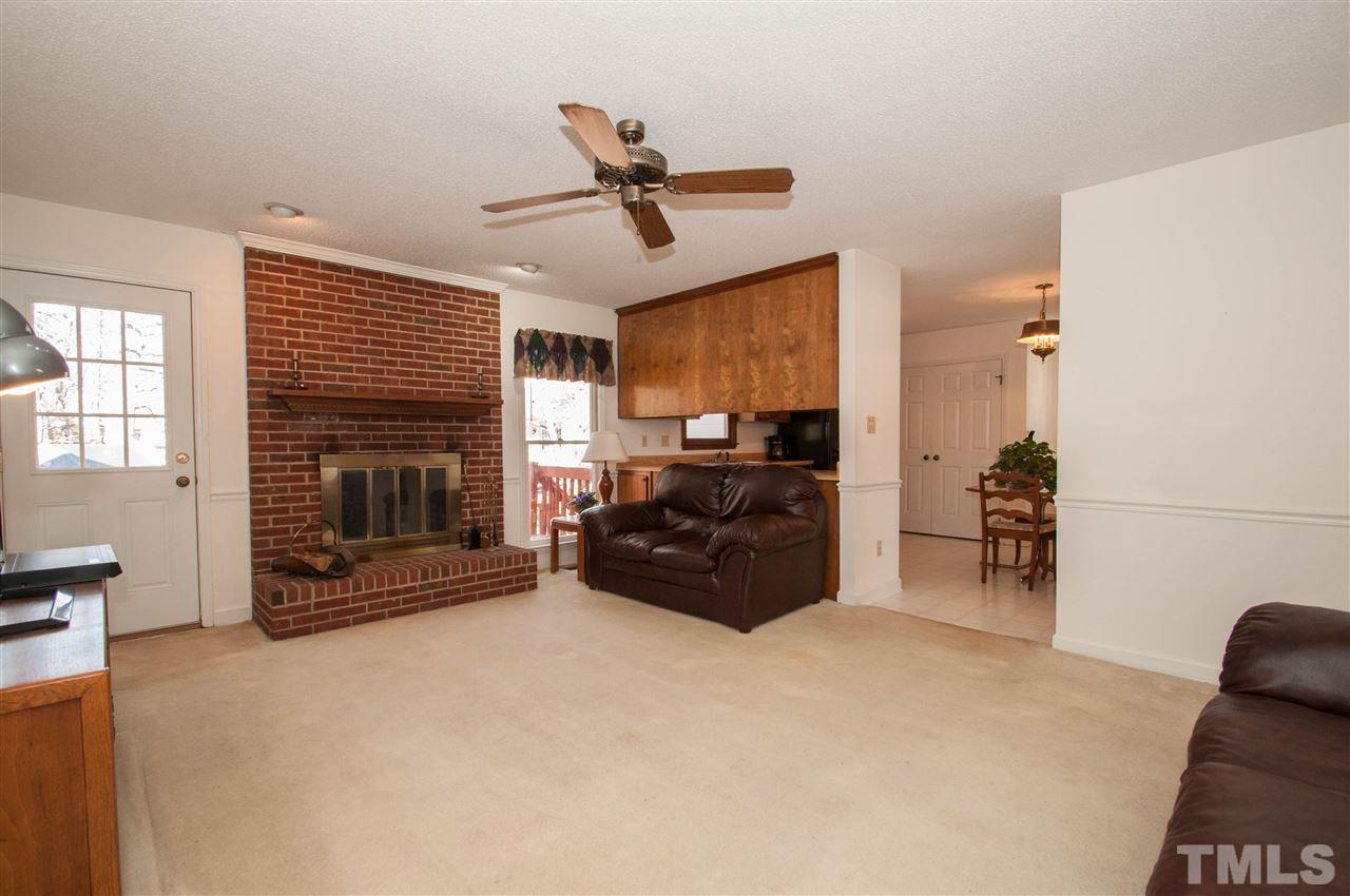 3517 Iron Sight Court Raleigh, NC 27616 - Photo 5 of 22 a living room with furniture and a fireplace
