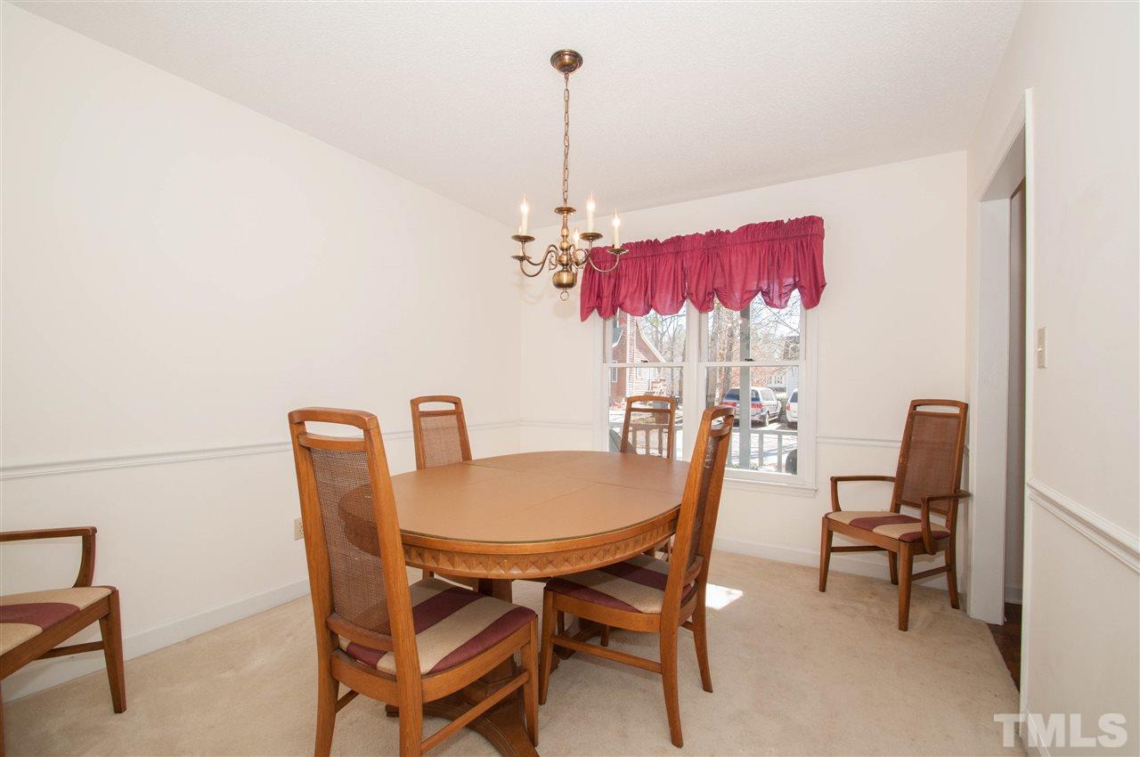 3517 Iron Sight Court Raleigh, NC 27616 - Photo 7 of 22 a view of a dining room with furniture and wooden floor