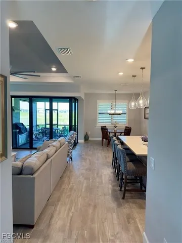 a room with furniture and a large window