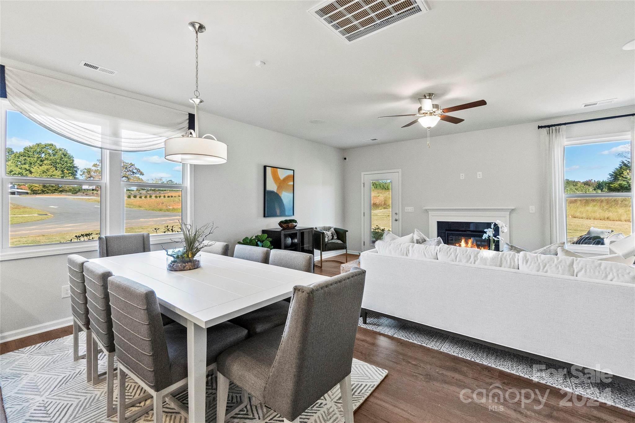 3182 Laurel Brook Drive Denver, NC 28037 - Photo 12 of 35 a view of a dining room with furniture window and outside view