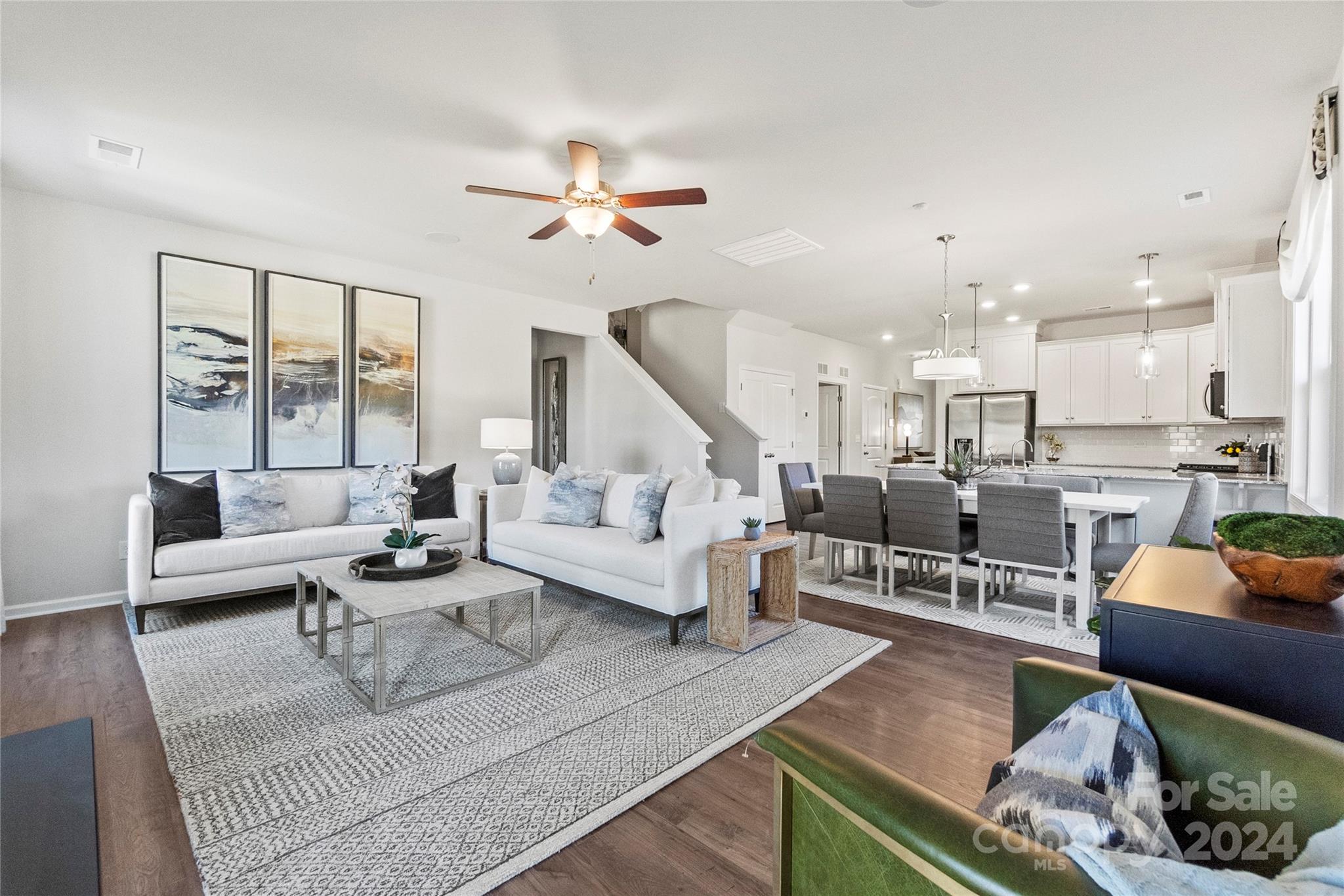 3182 Laurel Brook Drive Denver, NC 28037 - Photo 14 of 35 a living room with furniture and a large window