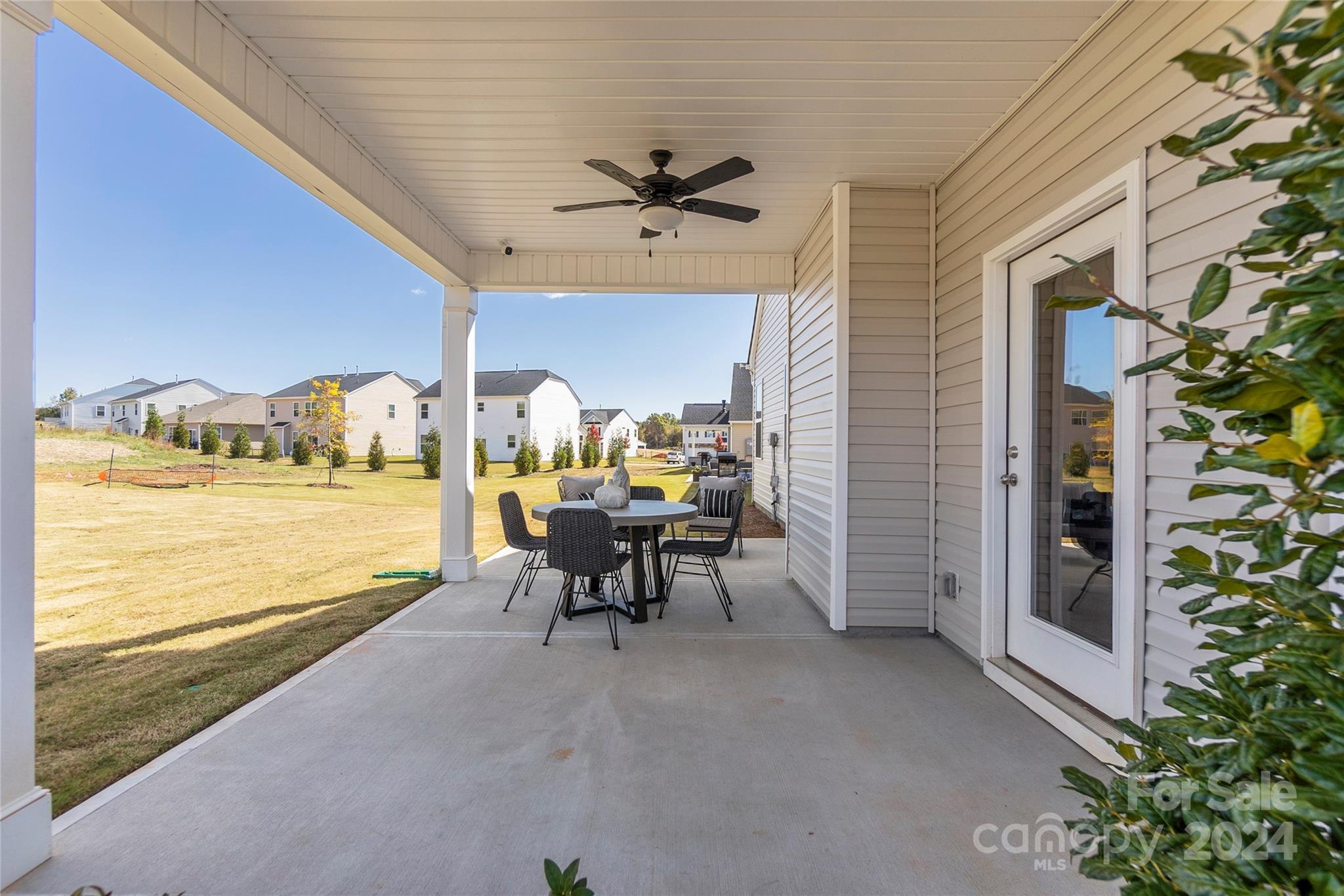 3182 Laurel Brook Drive Denver, NC 28037 - Photo 28 of 35 a view of a balcony with dining table and chairs