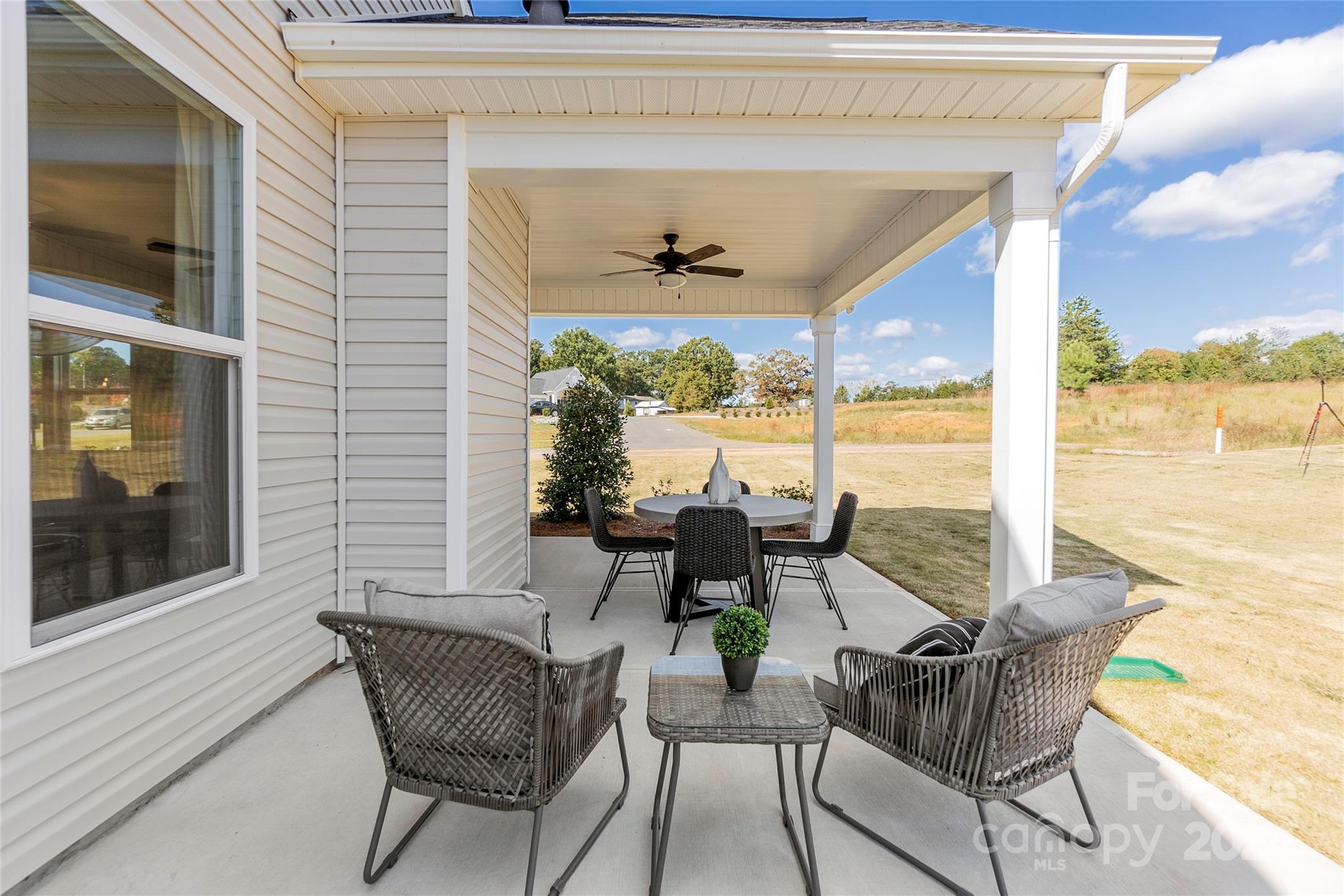 3182 Laurel Brook Drive Denver, NC 28037 - Photo 29 of 35 a view of a dining room with furniture window and outside view