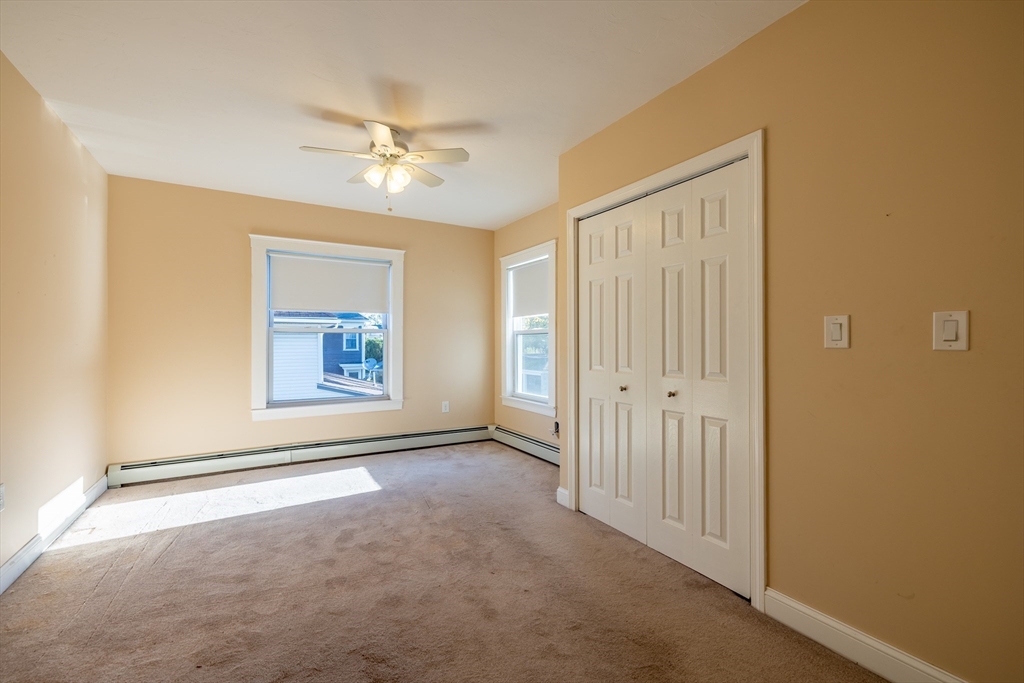 151 R Methuen Street, Unit 151R Lowell, MA 01850 - Photo 10 of 15 a view of an empty room with a window