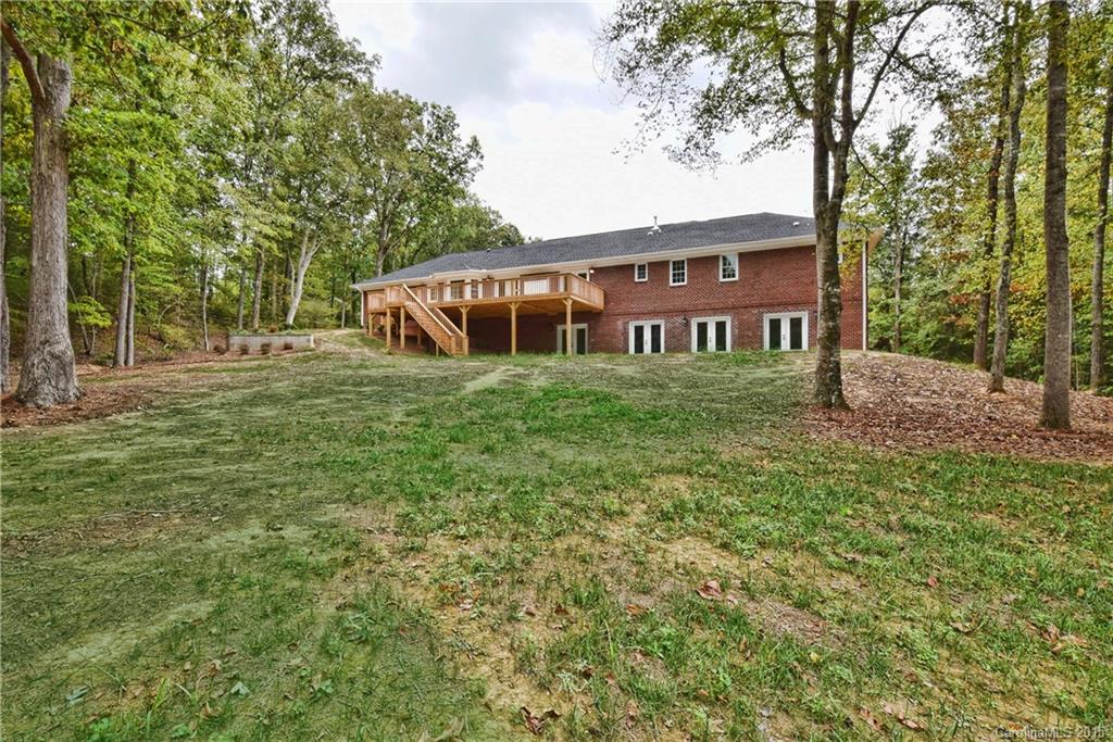 380 Point Carpenter Road Fort Mill, SC 29707 - Photo 22 of 23 a view of front of house with trees