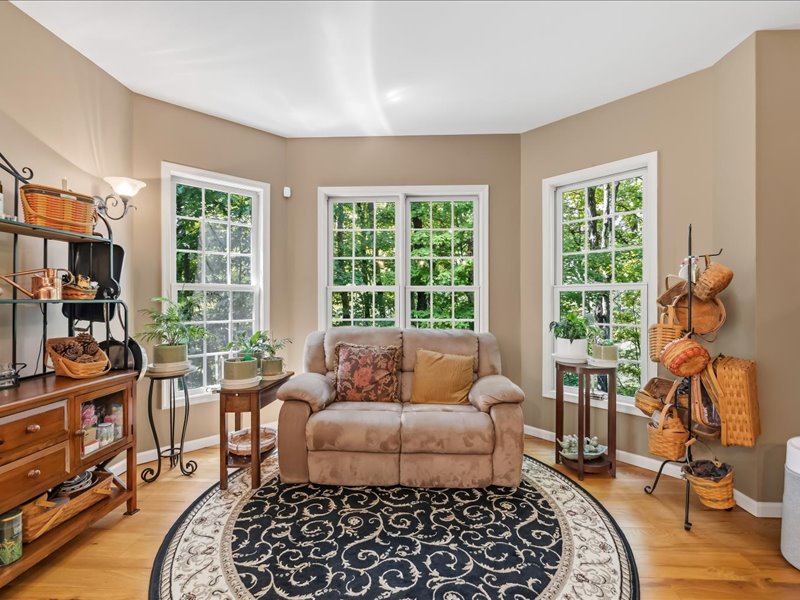 1168 Mt Pleasant Road Bangor, PA 18013 - Photo 40 of 100 A sunny bay window highlights this inviting sitting area with rich hardwood flooring.