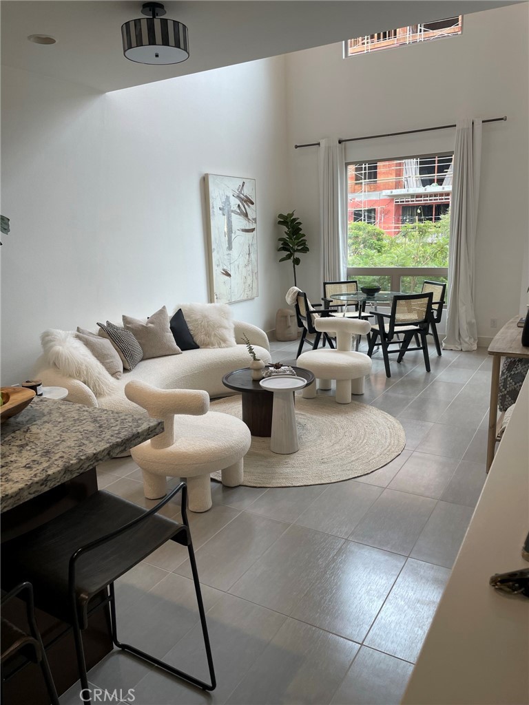 37 Soho Irvine, CA 92612 - Photo 5 of 11 a living room with furniture and window