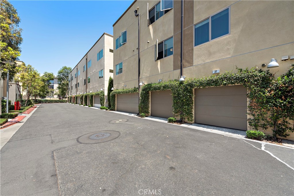 37 Soho Irvine, CA 92612 - Photo 10 of 11 a view of a street with a building in the background