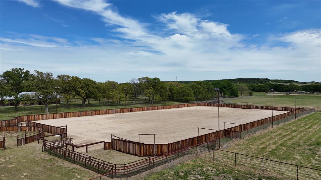 990 Doss Road Millsap, TX 76066 - Photo 4 of 39 a view of a swimming pool with a lake view