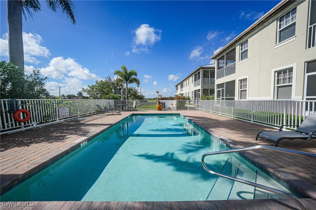 17084 Acapulco Road, Unit 211 Punta Gorda, FL 33955 - Photo 26 of 45 a view of a house with backyard and sitting area
