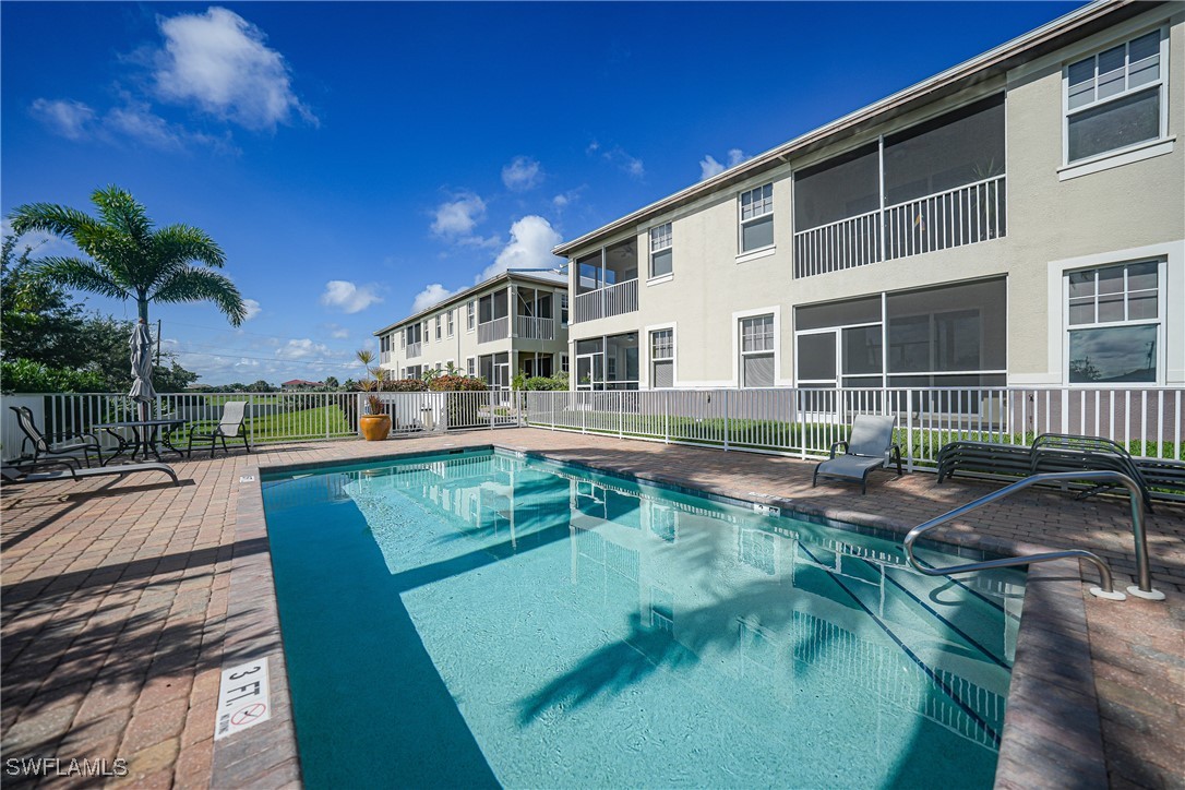 17084 Acapulco Road, Unit 211 Punta Gorda, FL 33955 - Photo 28 of 45 a view of a house with pool