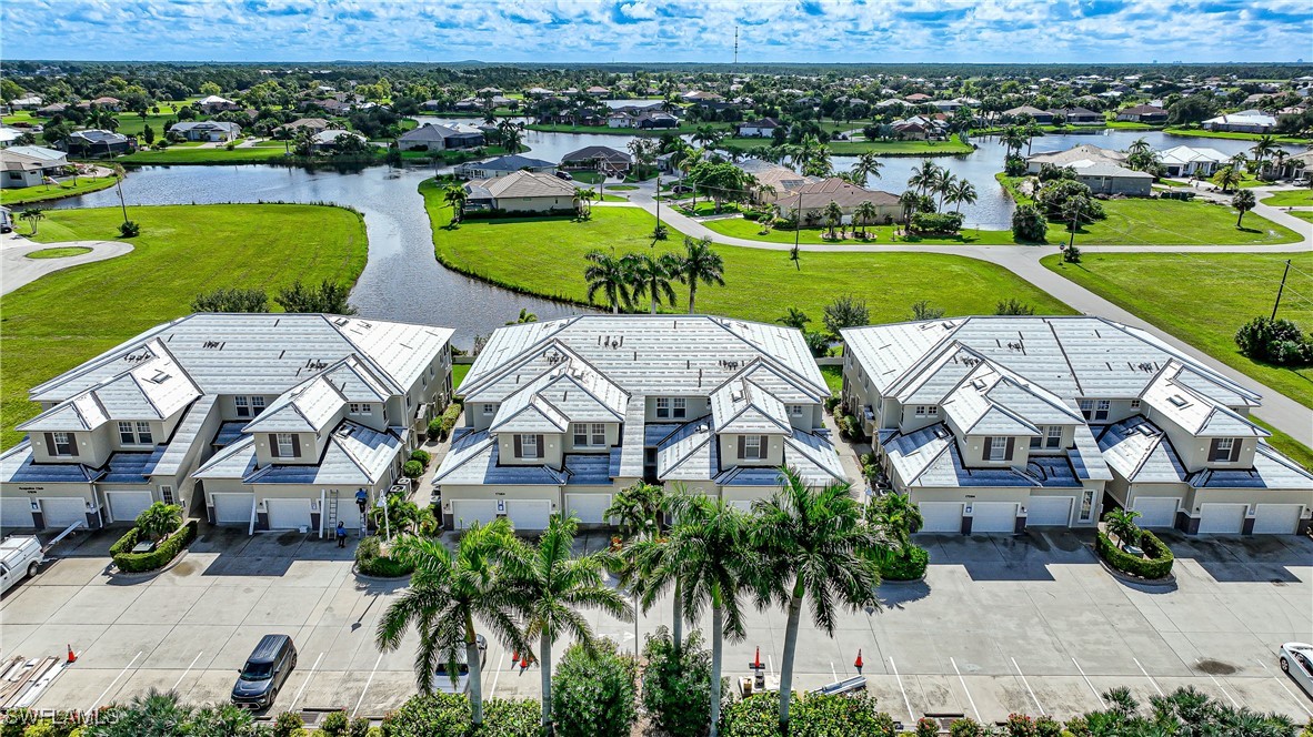 17084 Acapulco Road, Unit 211 Punta Gorda, FL 33955 - Photo 32 of 45 an aerial view of multiple house