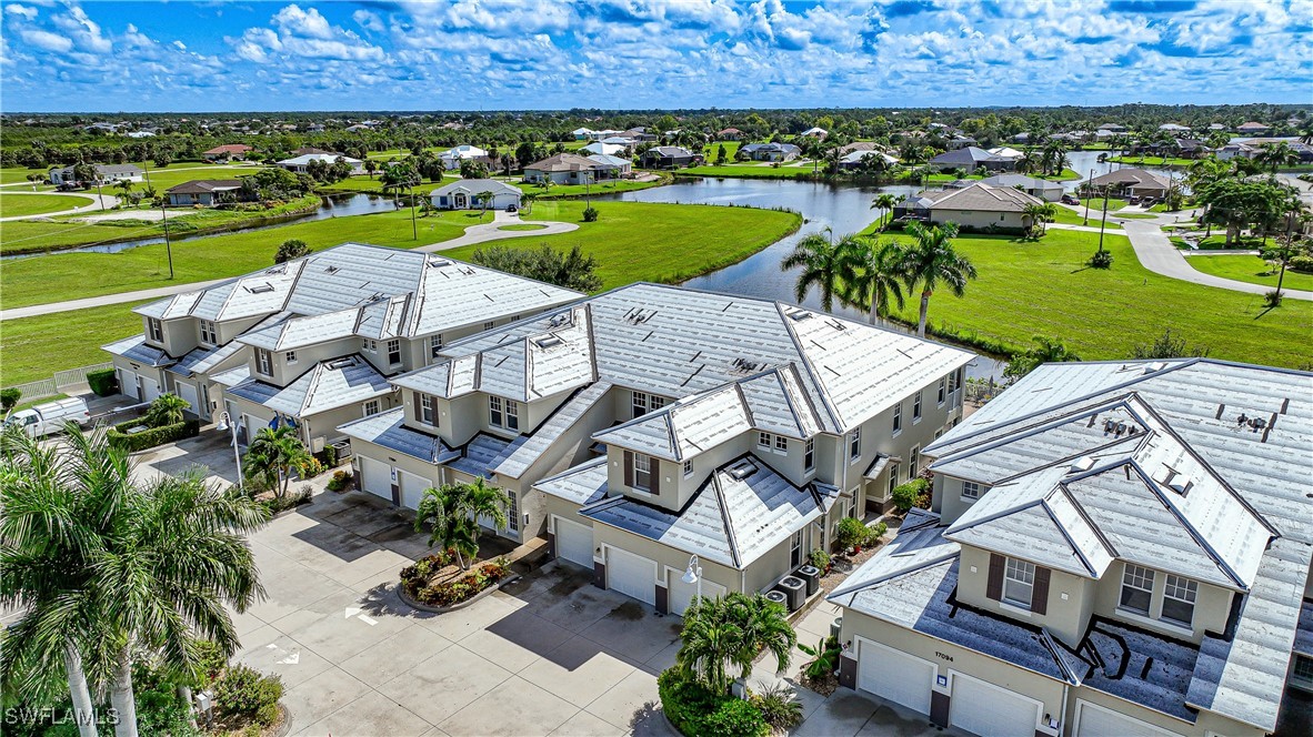 17084 Acapulco Road, Unit 211 Punta Gorda, FL 33955 - Photo 40 of 45 an aerial view of a house with a garden