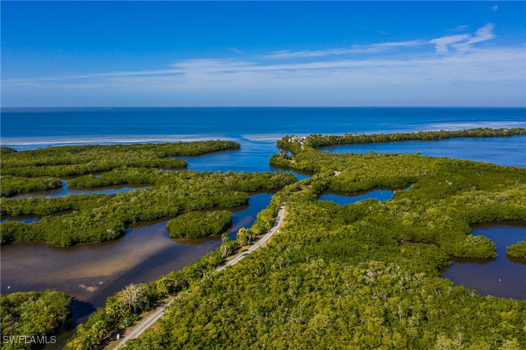 17084 Acapulco Road, Unit 211 Punta Gorda, FL 33955 - Photo 43 of 45 a view of a garden with an ocean