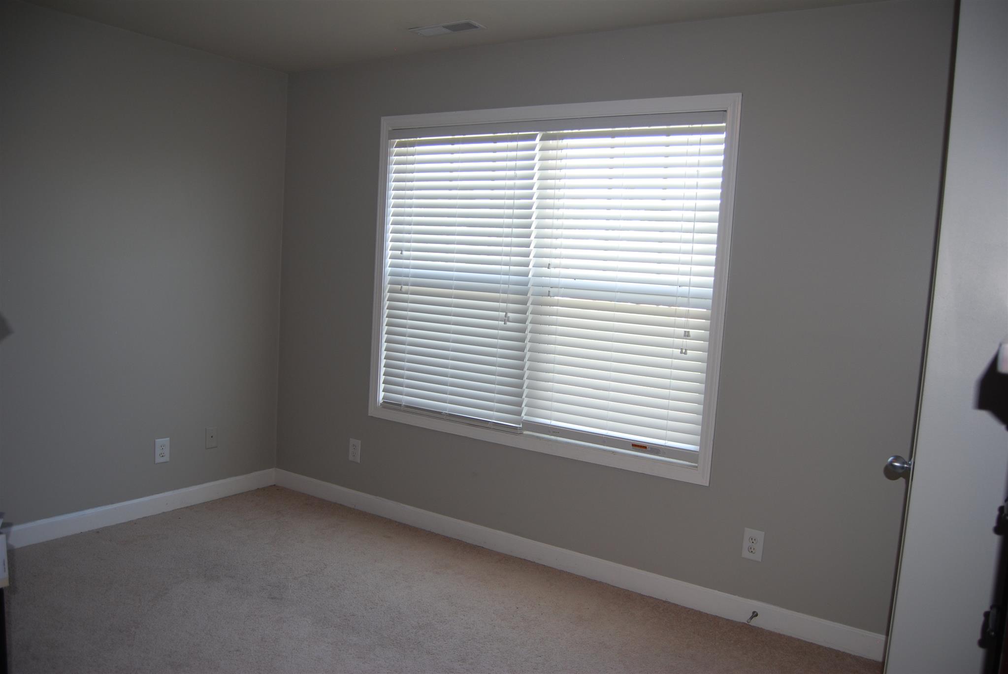 6003 Chickadee Circle Spring Hill, TN 37174 - Photo 13 of 23 an empty room with a window