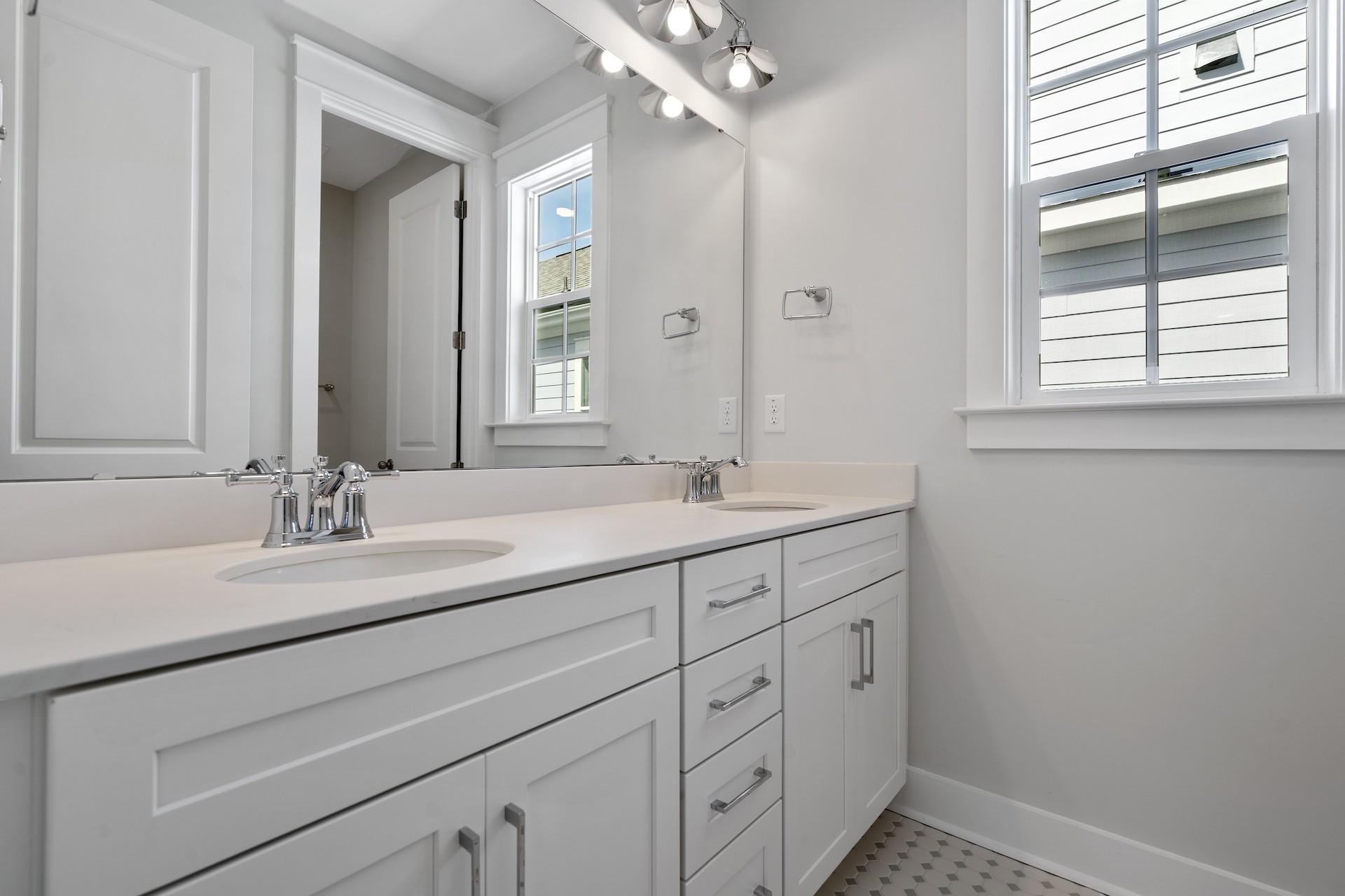 463 Dewar Drive Franklin, TN 37064 - Photo 20 of 31 a bathroom with double sink and a mirror