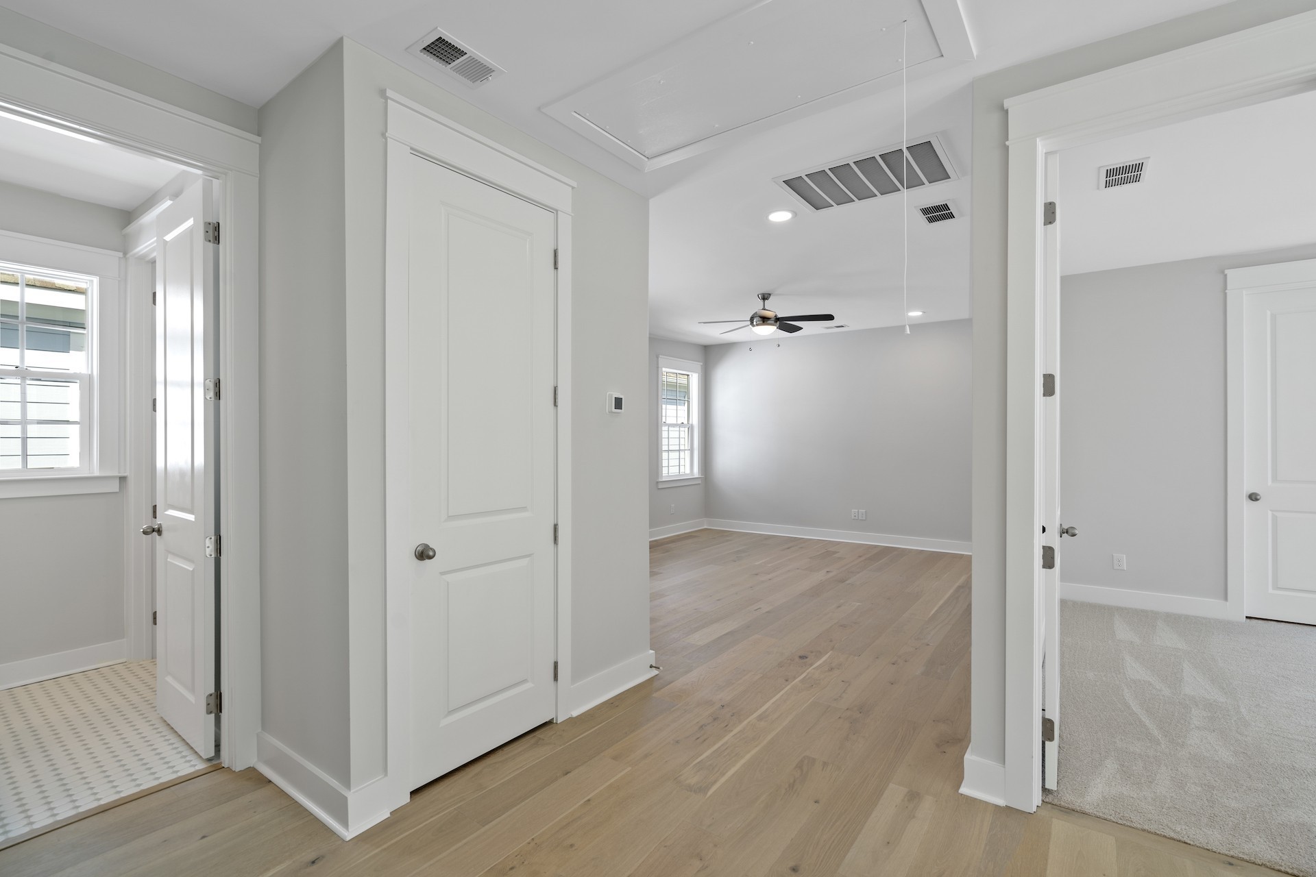 463 Dewar Drive Franklin, TN 37064 - Photo 24 of 31 an empty room with wooden floor and mirror