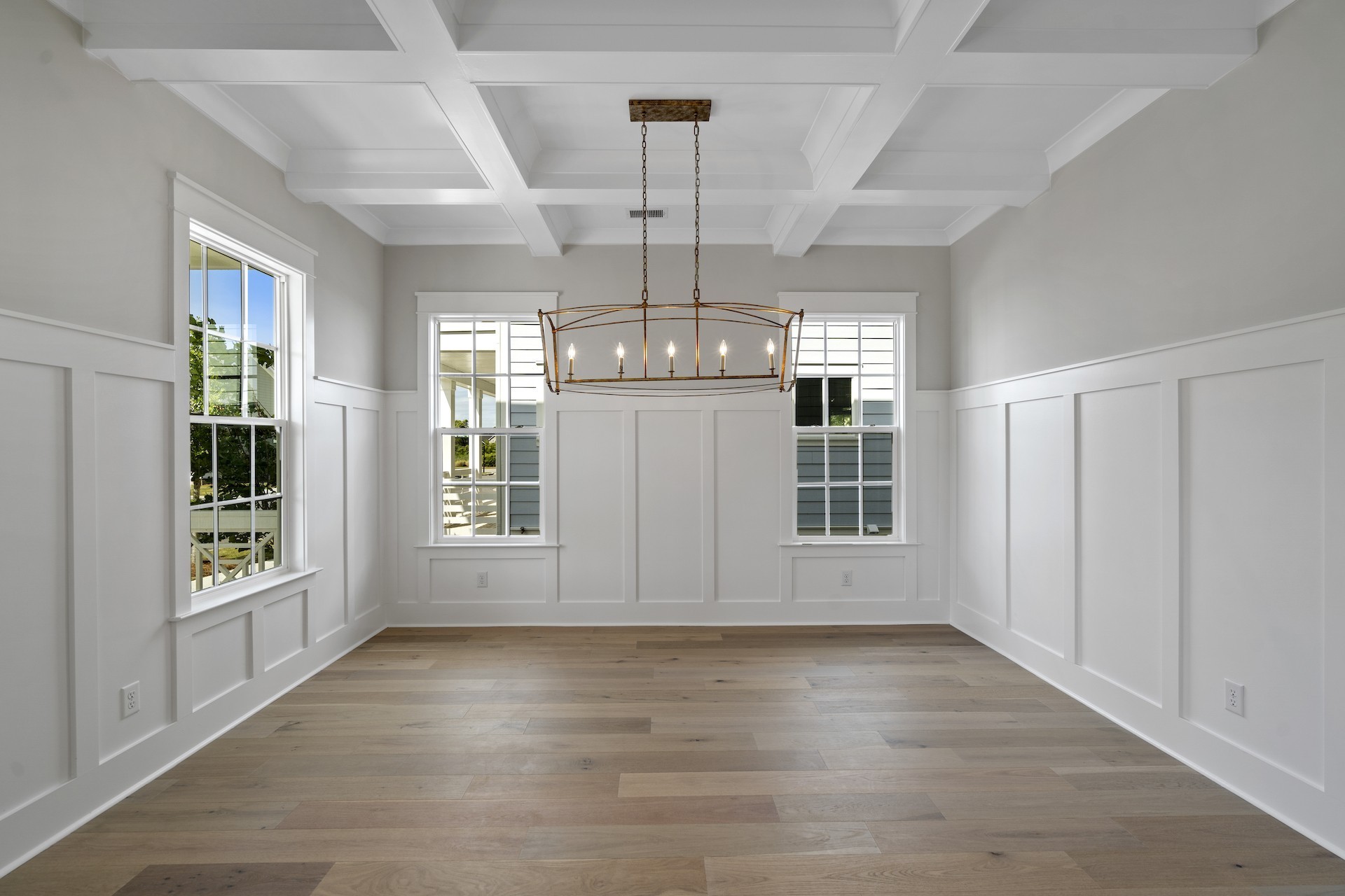 463 Dewar Drive Franklin, TN 37064 - Photo 4 of 31 an empty room with wooden floor and windows