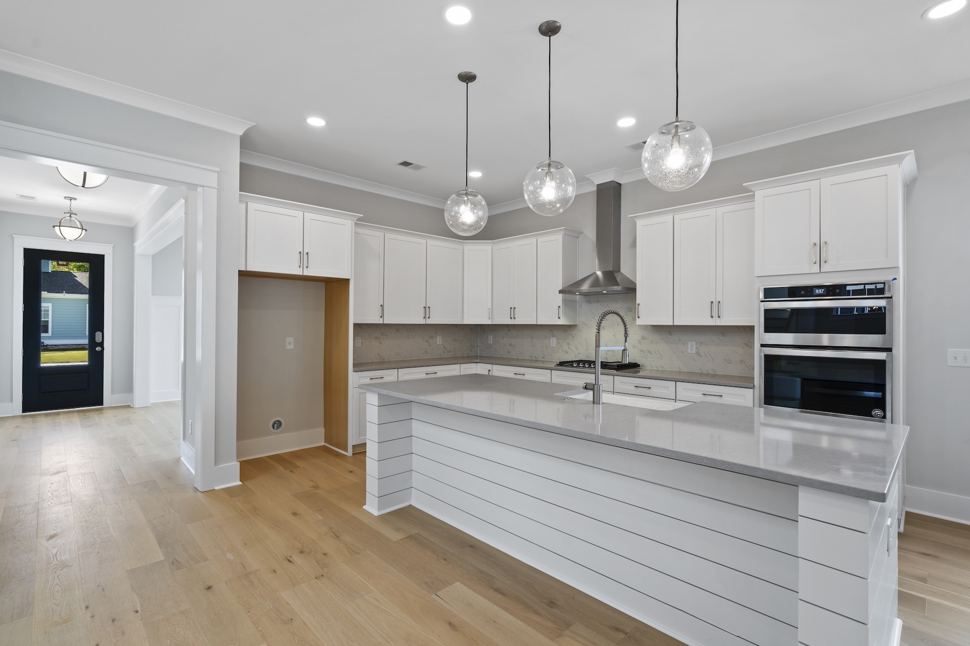 463 Dewar Drive Franklin, TN 37064 - Photo 8 of 31 a kitchen with stainless steel appliances granite countertop a sink and a refrigerator