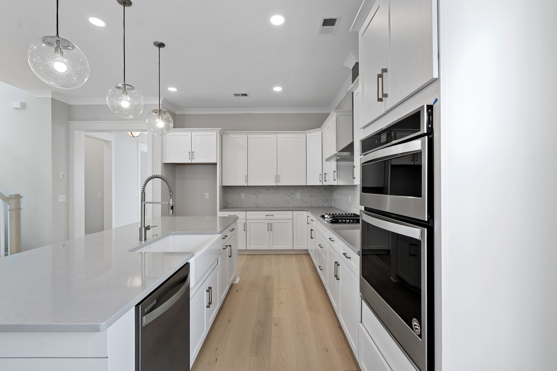 463 Dewar Drive Franklin, TN 37064 - Photo 10 of 31 a kitchen with a sink stainless steel appliances and cabinets