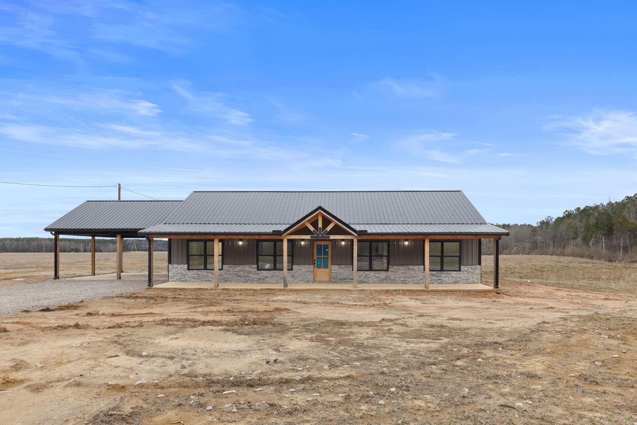 458 County Road 514 Rienzi, MS 38865 - Photo 1 of 34 a front view of a house with a yard