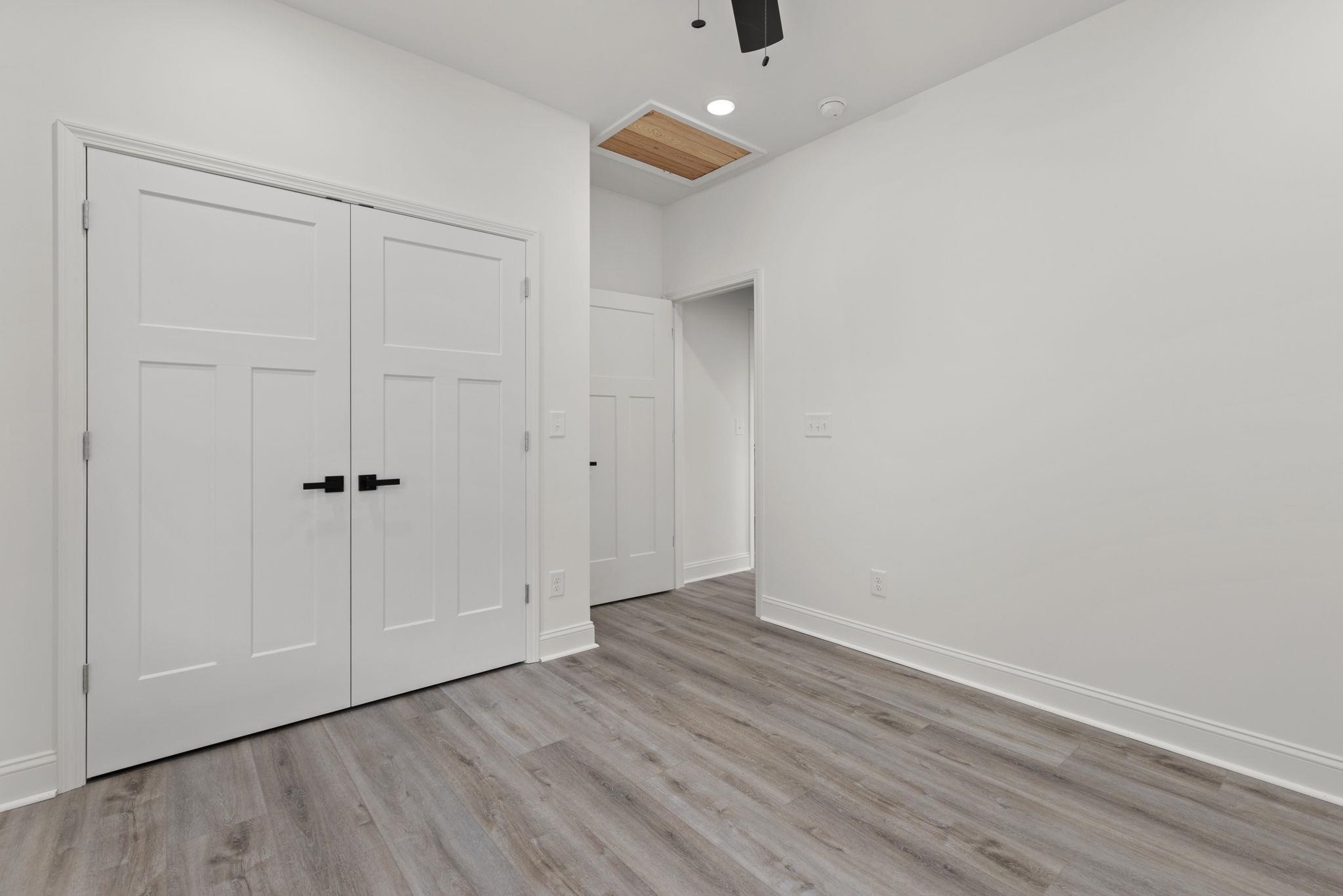 458 County Road 514 Rienzi, MS 38865 - Photo 13 of 34 a view of an empty room with wooden floor