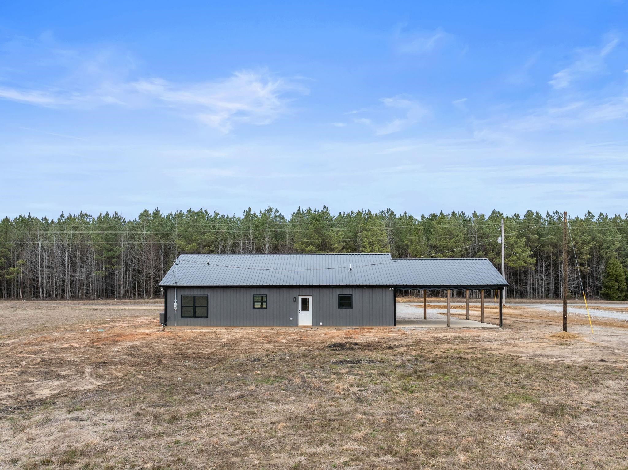 458 County Road 514 Rienzi, MS 38865 - Photo 18 of 34 a view of a house with a yard