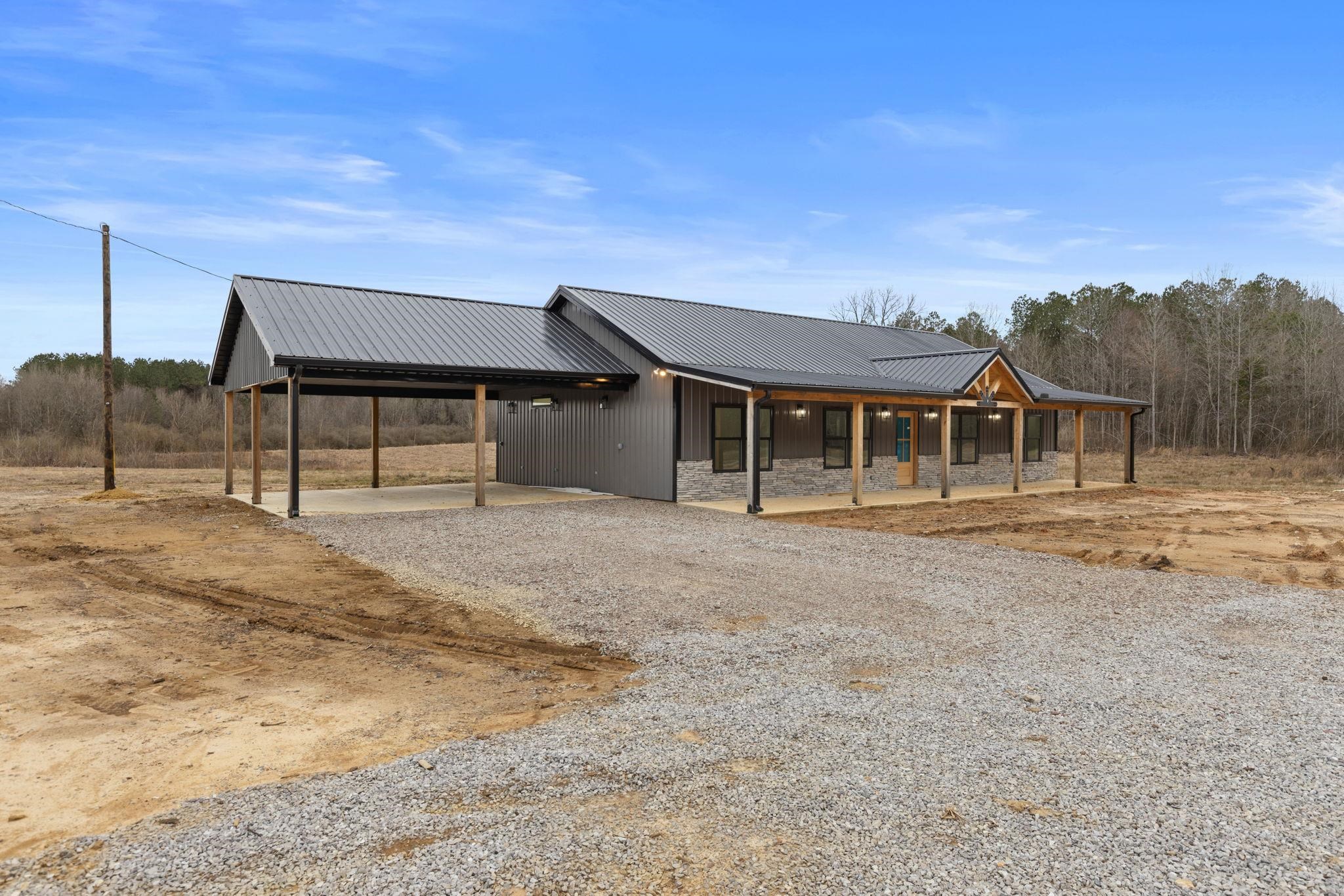 458 County Road 514 Rienzi, MS 38865 - Photo 2 of 34 front view of a house with a balcony