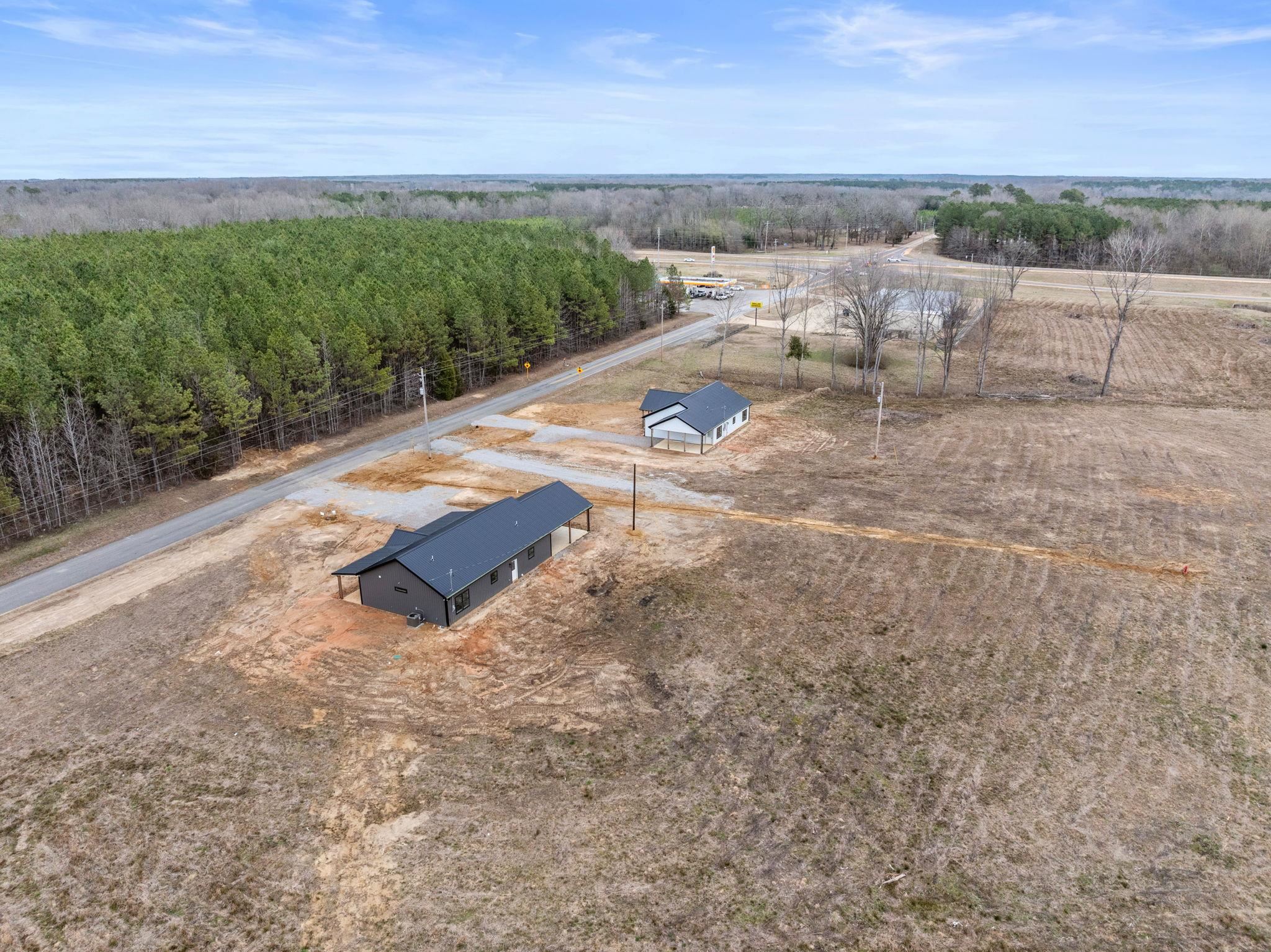 458 County Road 514 Rienzi, MS 38865 - Photo 26 of 34 a view of a backyard with lawn chairs