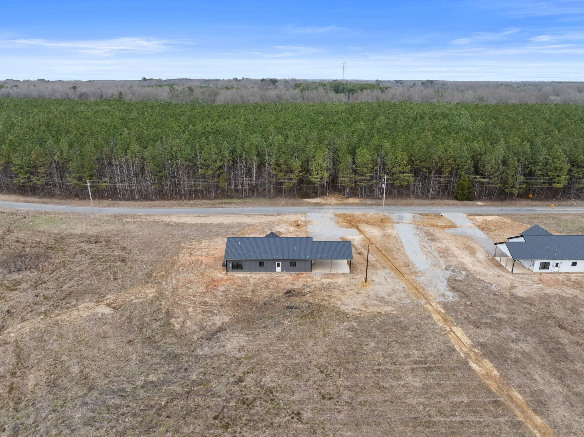 458 County Road 514 Rienzi, MS 38865 - Photo 28 of 34 a backyard of a house with table and chairs