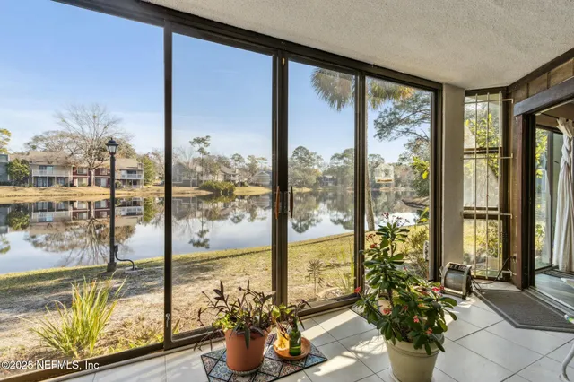 a living room with large windows