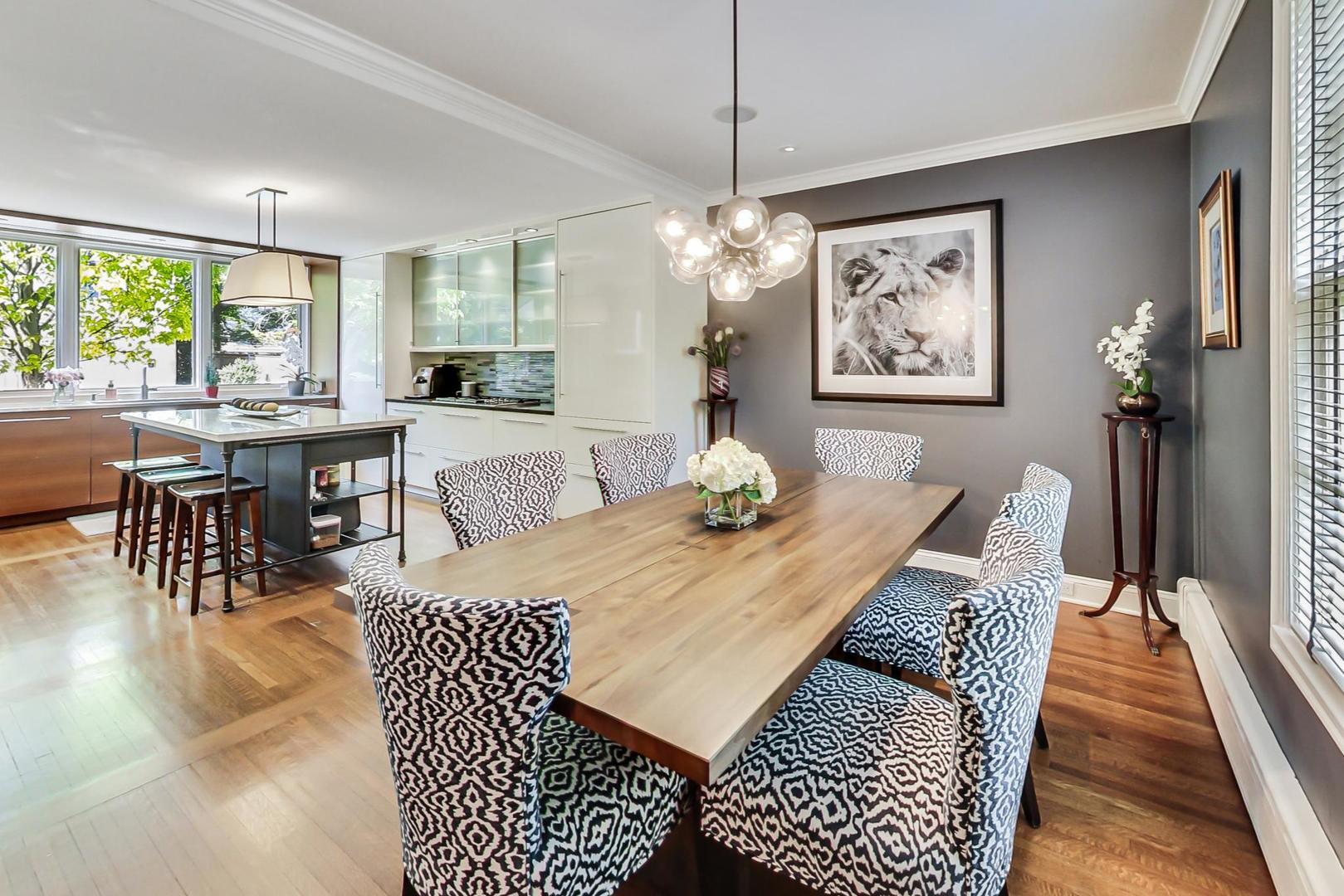 385 Washington Avenue Glencoe, IL 60022 - Photo 11 of 50 a view of a dining room with furniture window and outside view