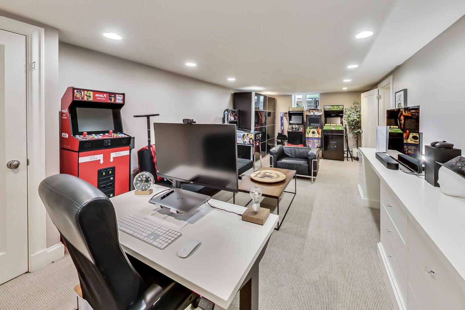 385 Washington Avenue Glencoe, IL 60022 - Photo 34 of 50 a living room with furniture a flat screen tv and kitchen view