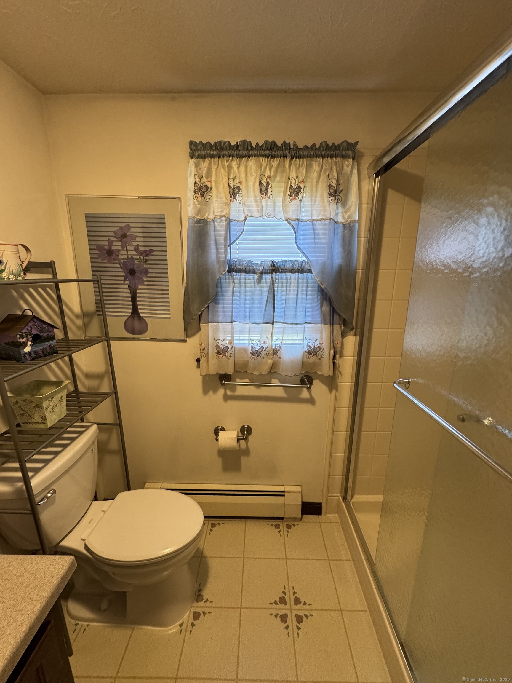 67 Royal Oak Circle Meriden, CT 06450 - Photo 22 of 25 a bathroom with a sink mirror vanity and toilet