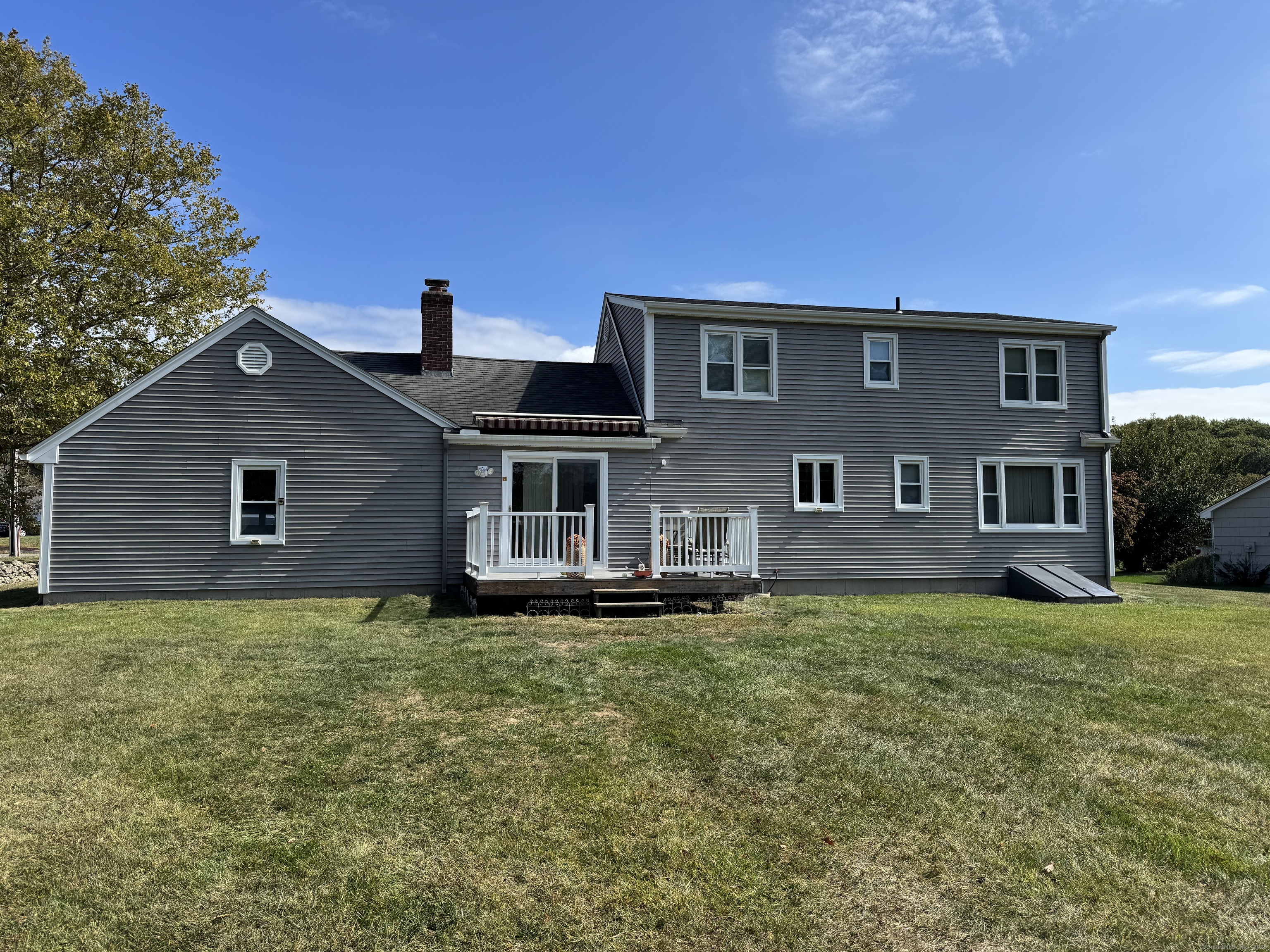 67 Royal Oak Circle Meriden, CT 06450 - Photo 5 of 25 a house that has a big yard in front of it