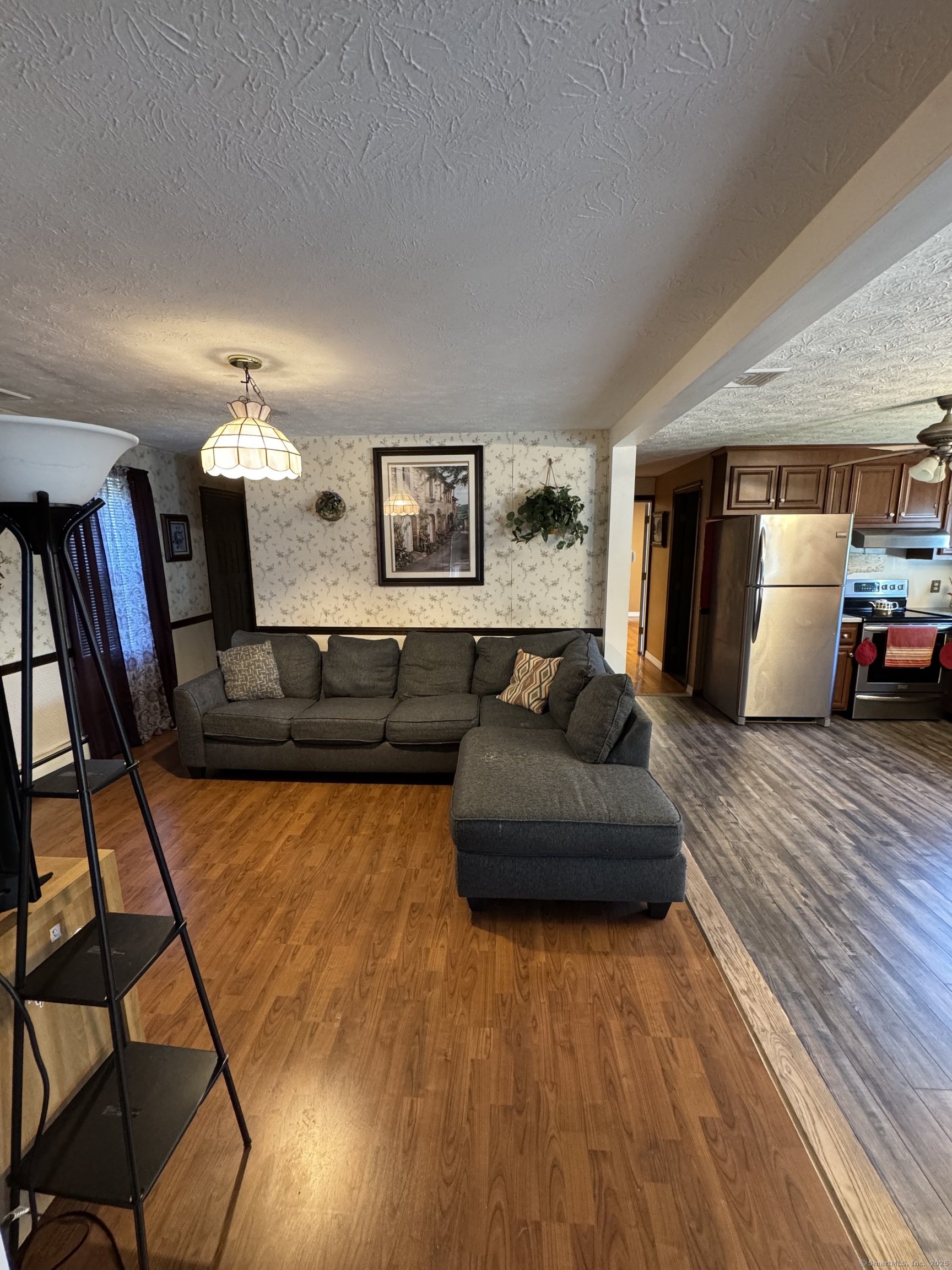 67 Royal Oak Circle Meriden, CT 06450 - Photo 10 of 25 a living room with furniture and wooden floor