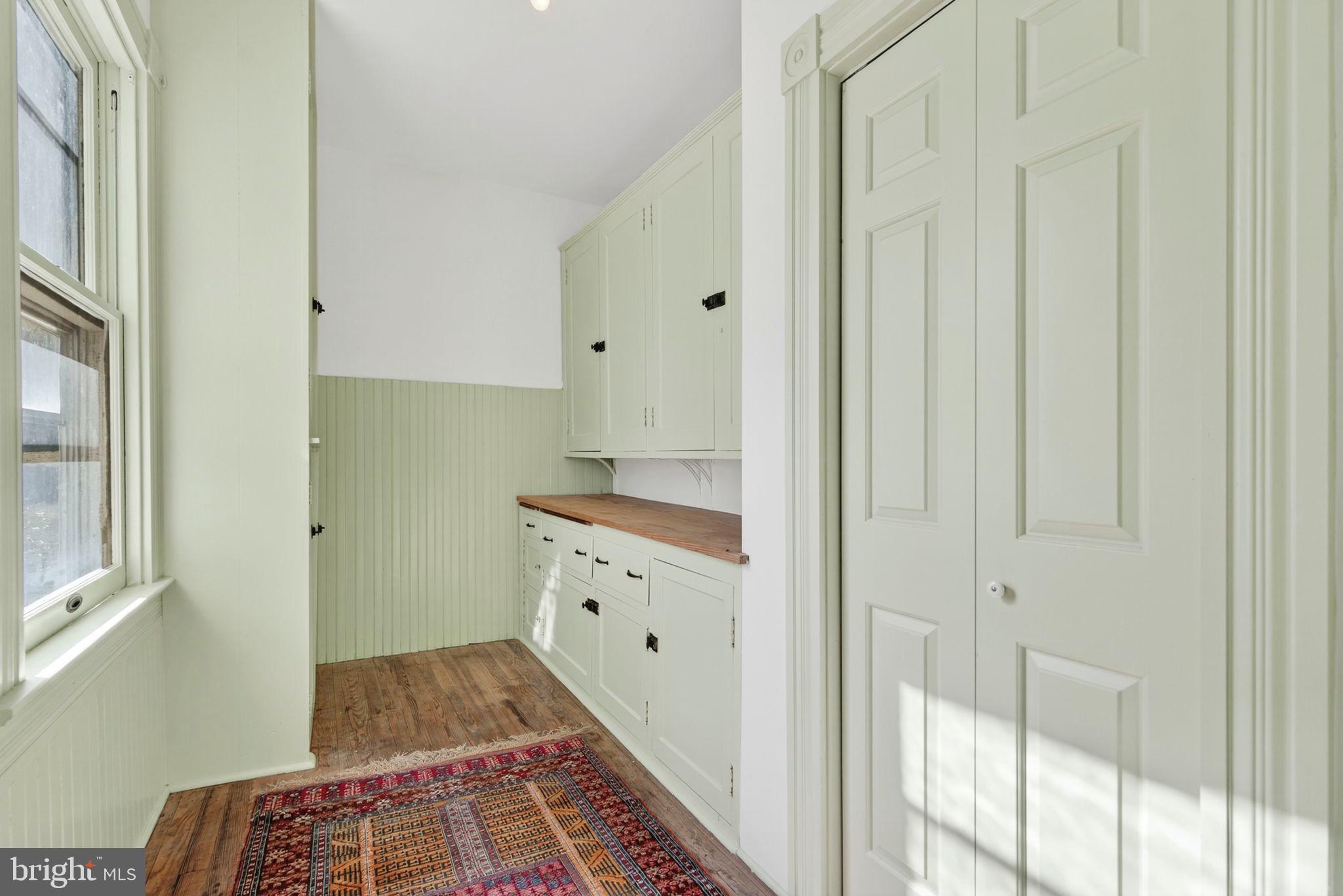 4561 Weston Road Catlett, VA 20119 - Photo 17 of 59 Charming green-hued utility space with warmth.