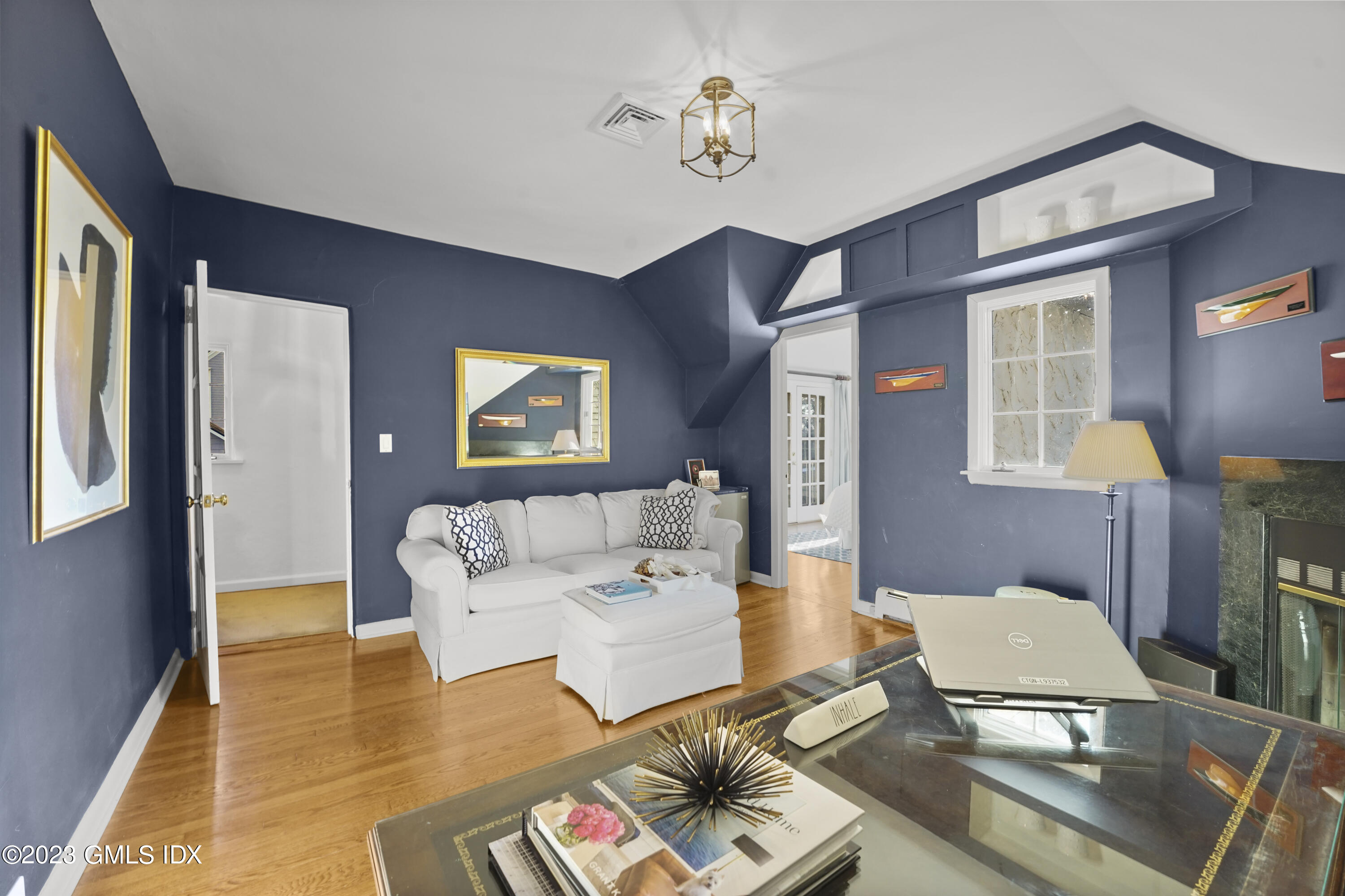 7 Gilliam Lane Riverside, CT 06878 - Photo 23 of 42 a living room with furniture and a table