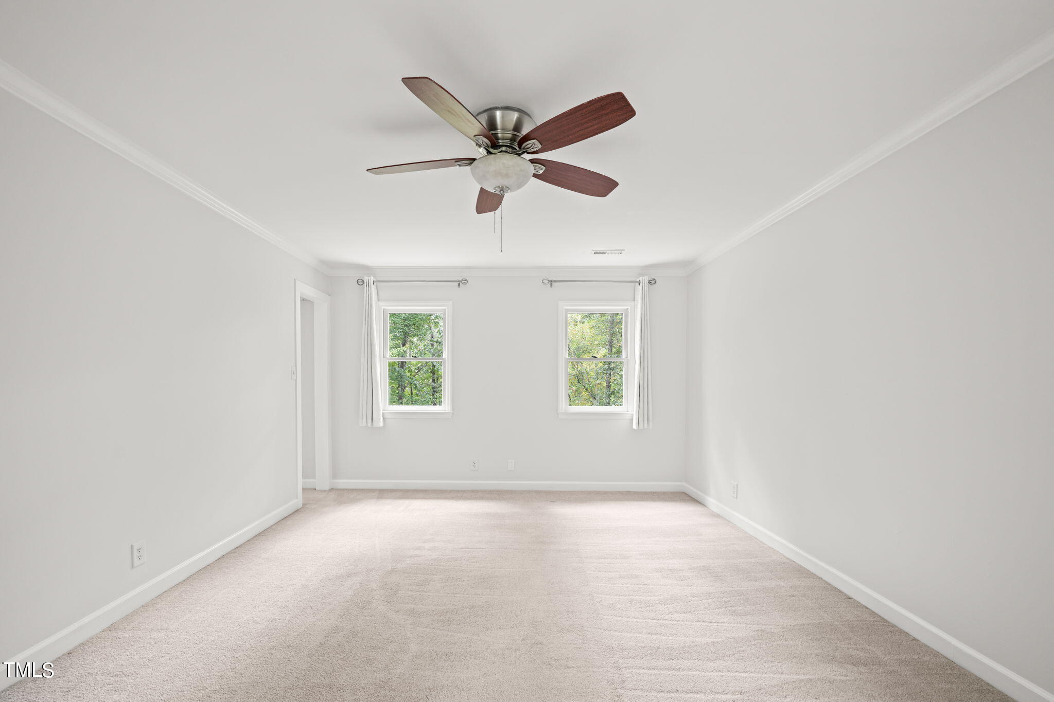 2835 Fox Drive Durham, NC 27712 - Photo 27 of 53 a view of room with window and ceiling fan