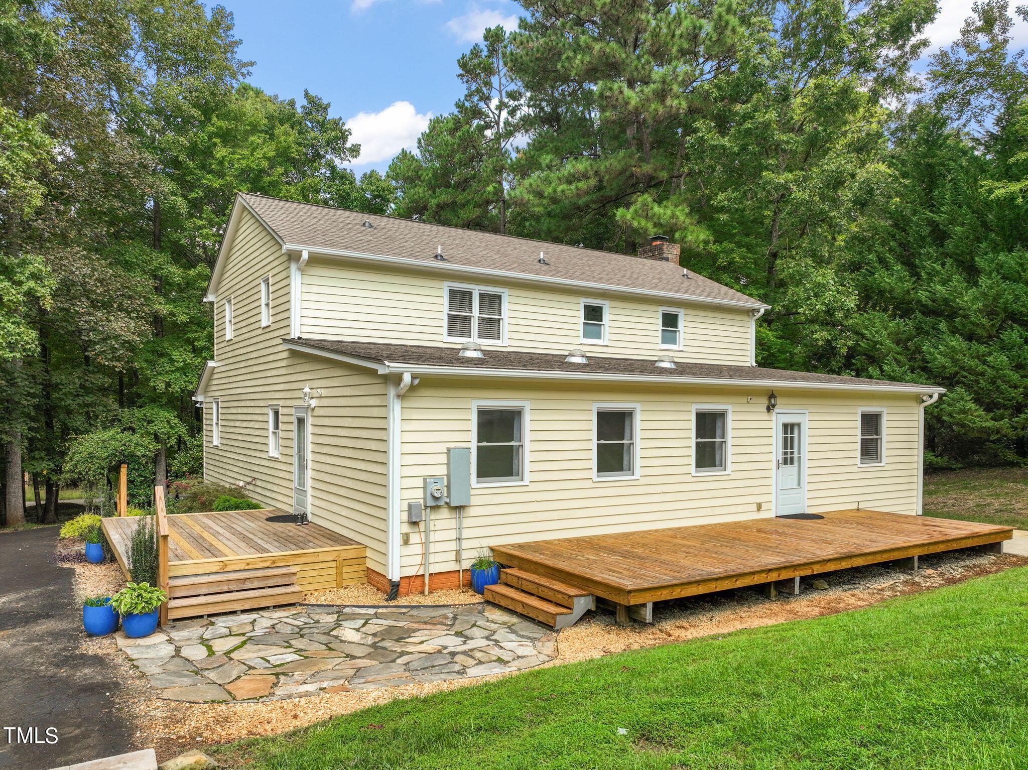 2835 Fox Drive Durham, NC 27712 - Photo 40 of 53 a backyard of a house with barbeque oven