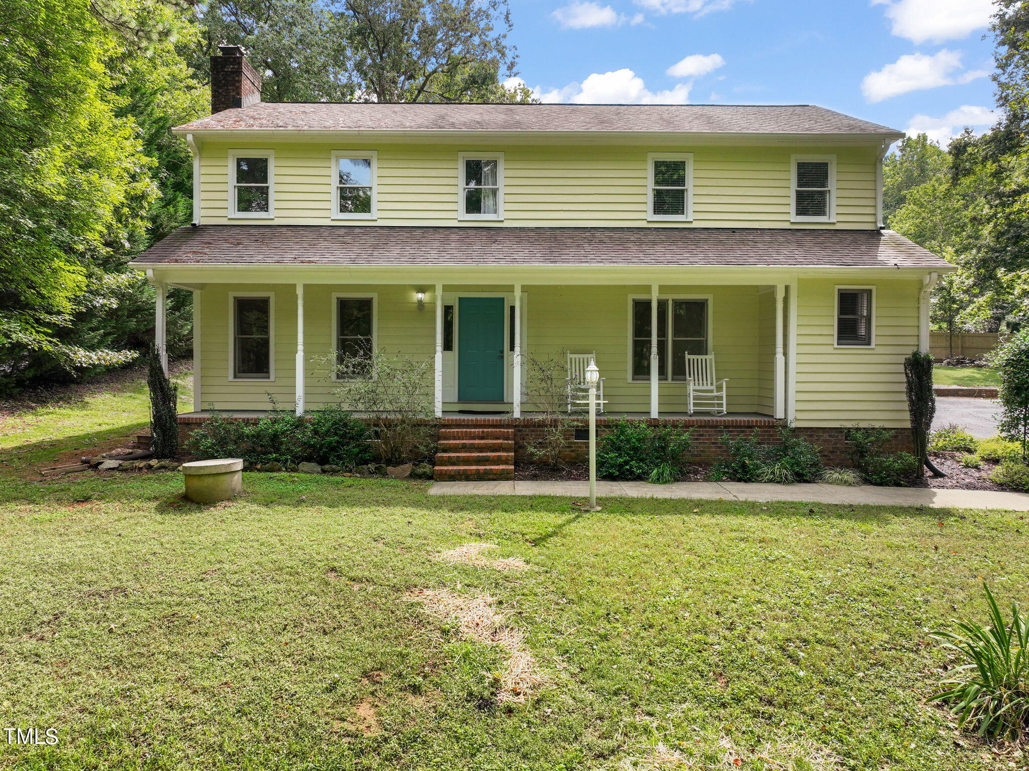2835 Fox Drive Durham, NC 27712 - Photo 47 of 53 a view of a house with a yard patio and fire pit