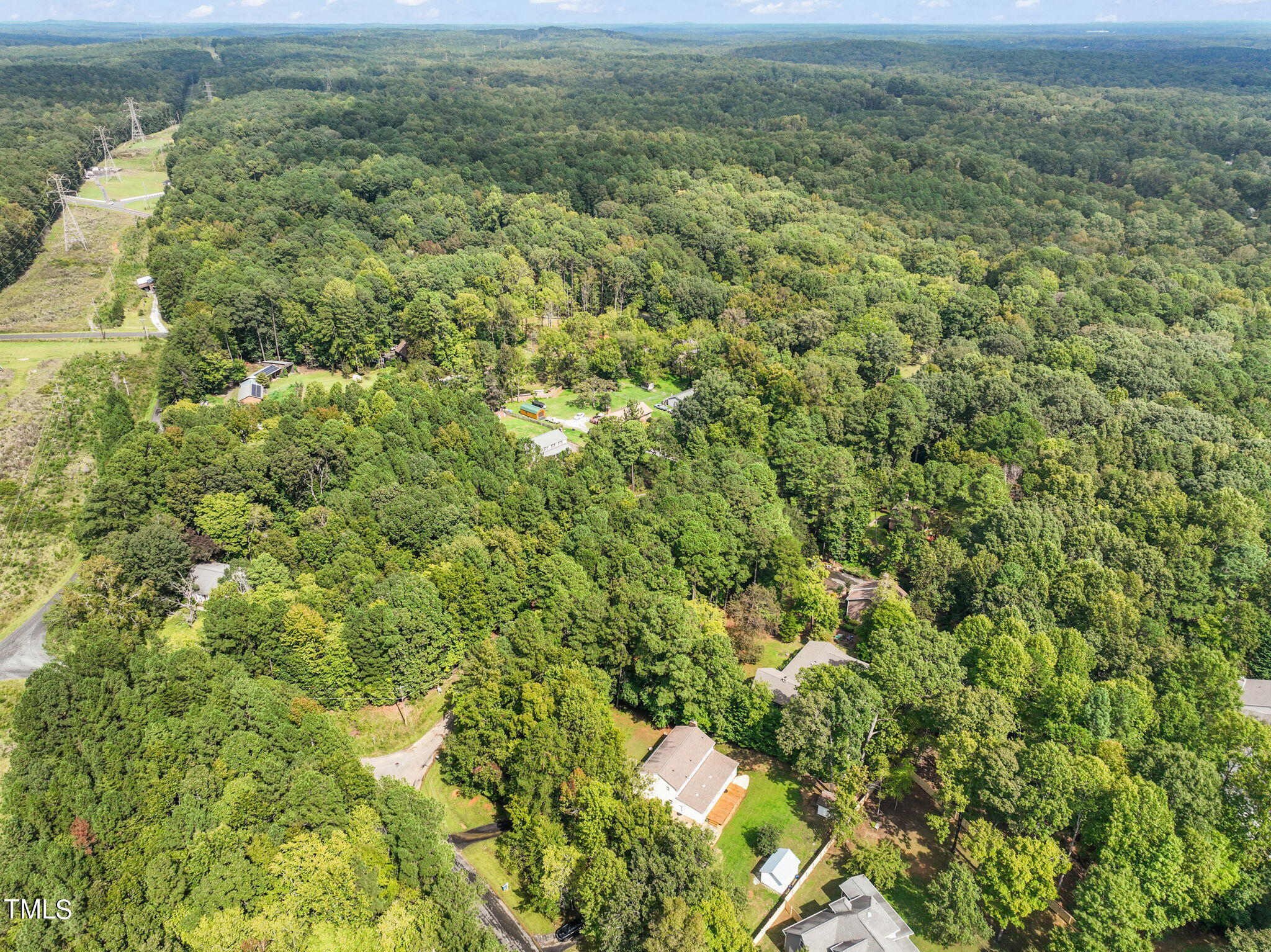 2835 Fox Drive Durham, NC 27712 - Photo 53 of 53 an aerial view of residential houses with outdoor space and trees