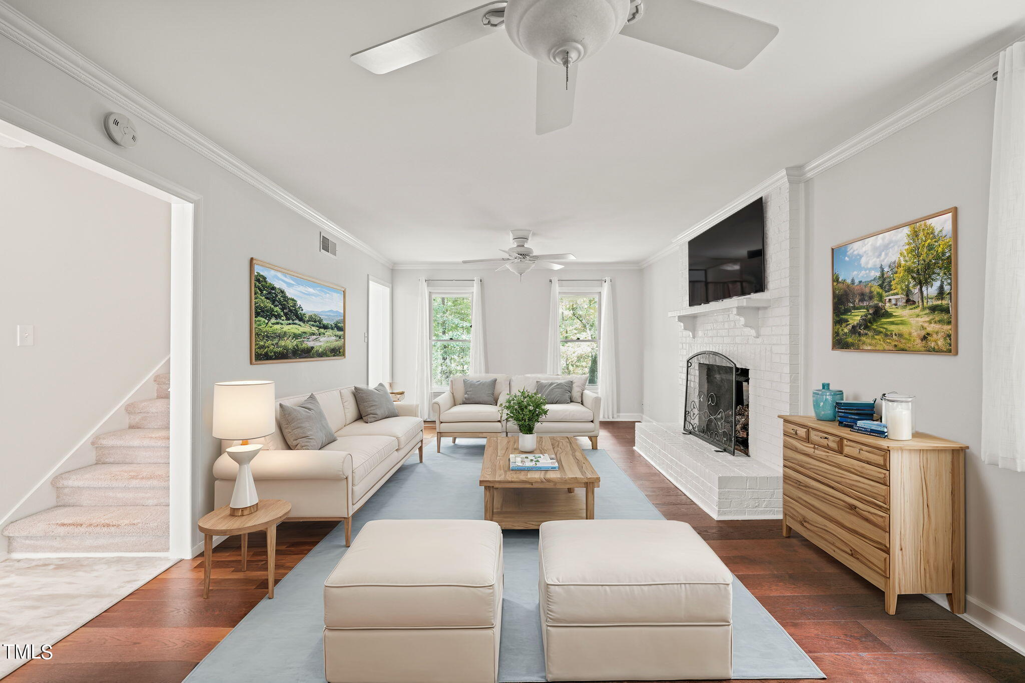 2835 Fox Drive Durham, NC 27712 - Photo 9 of 53 a living room with fireplace furniture and a flat screen tv