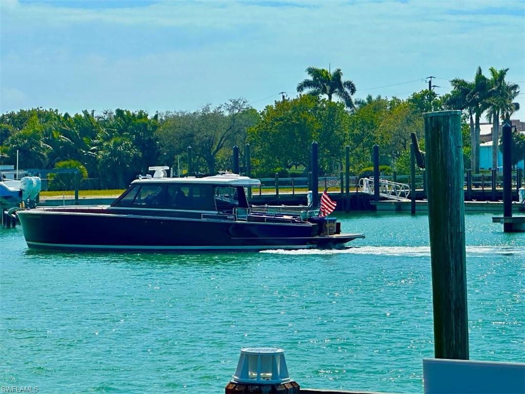 410 Cristobal Street Naples, FL 34113 - Photo 22 of 50 a view of a yard with a slide
